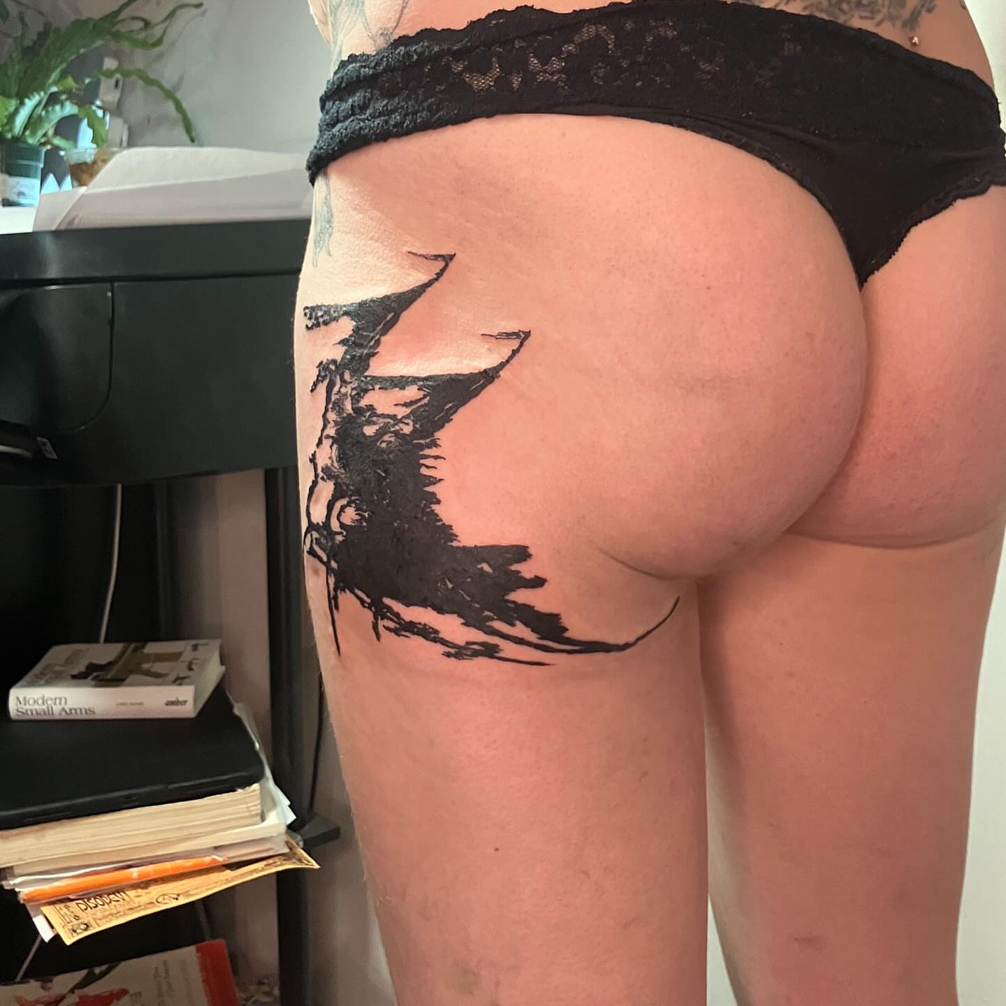 Abstract shape black and grey tattoo on the thigh by @godsfirmgrip