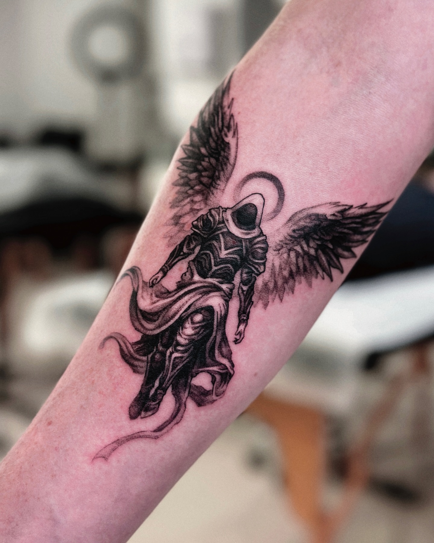 Angelic warrior realism tattoo on the forearm by 두식