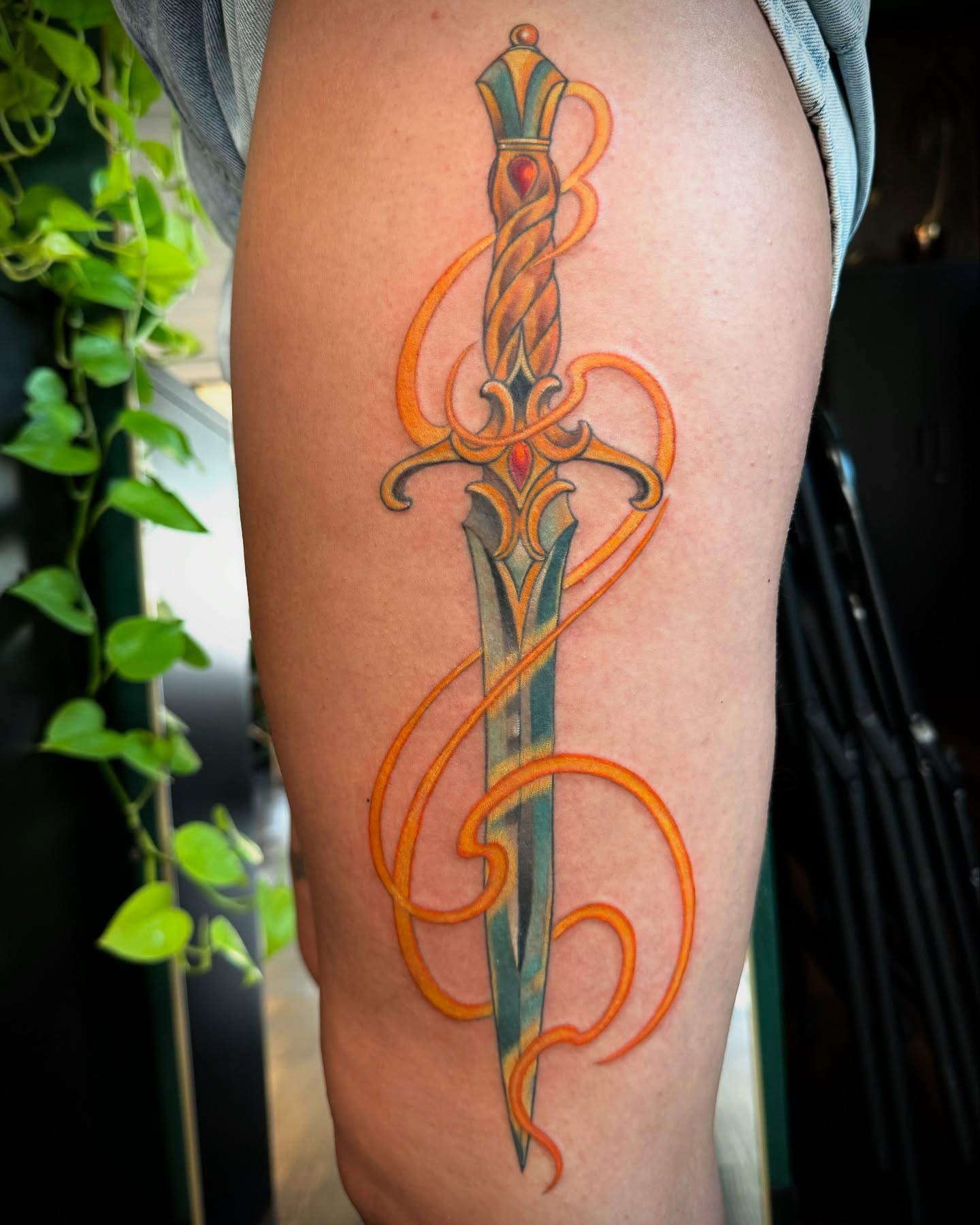 Sword ornamental tattoo on the thigh by Chelsea Youngblood, Seattle, Washington