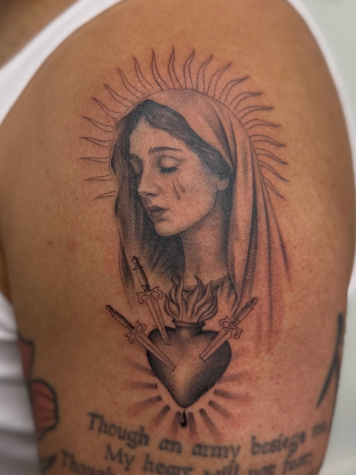Sacred heart with woman realism tattoo on the shoulder by liliana lopez