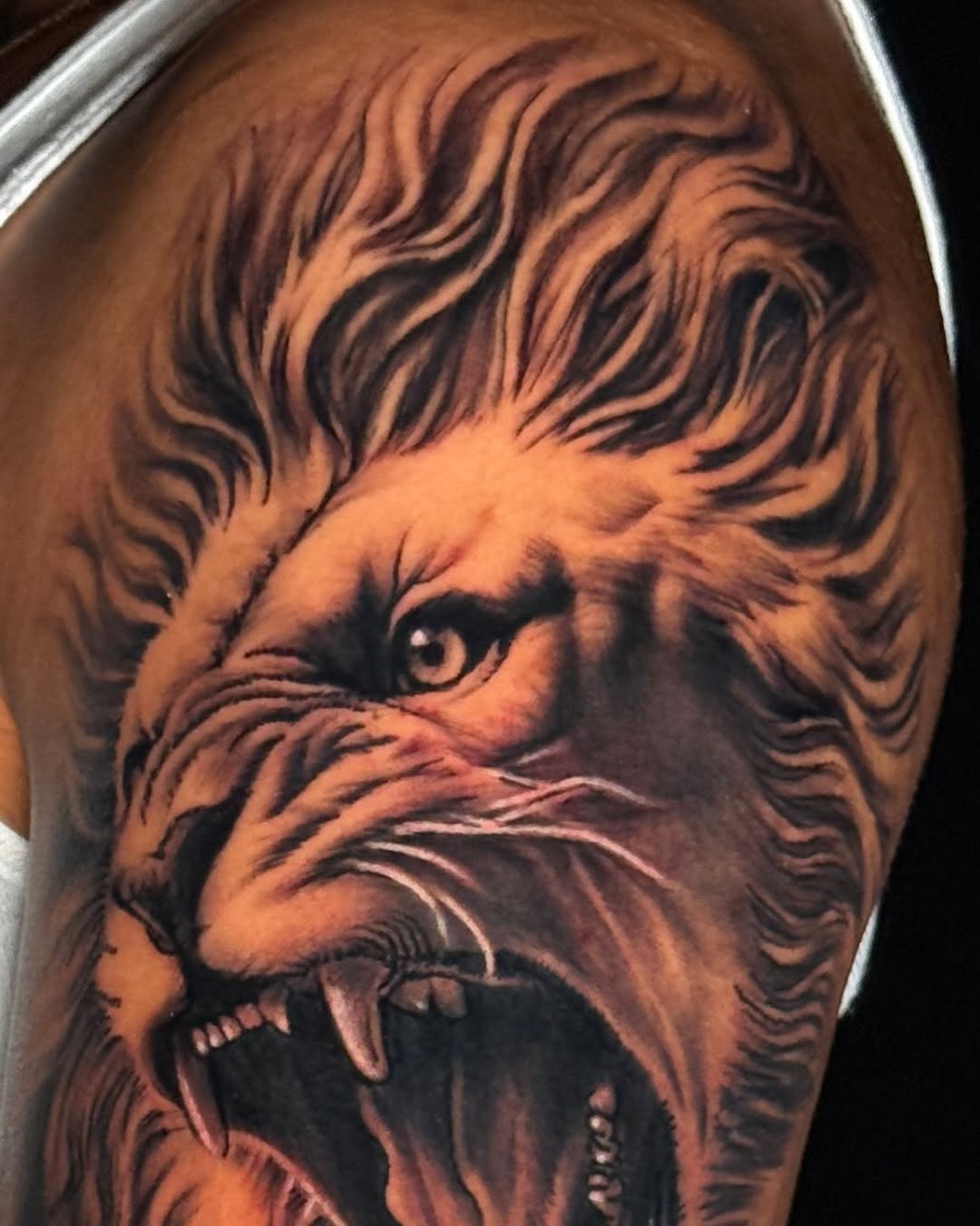 Tattoo by @tattsbyethan_ — realism, black_and_grey