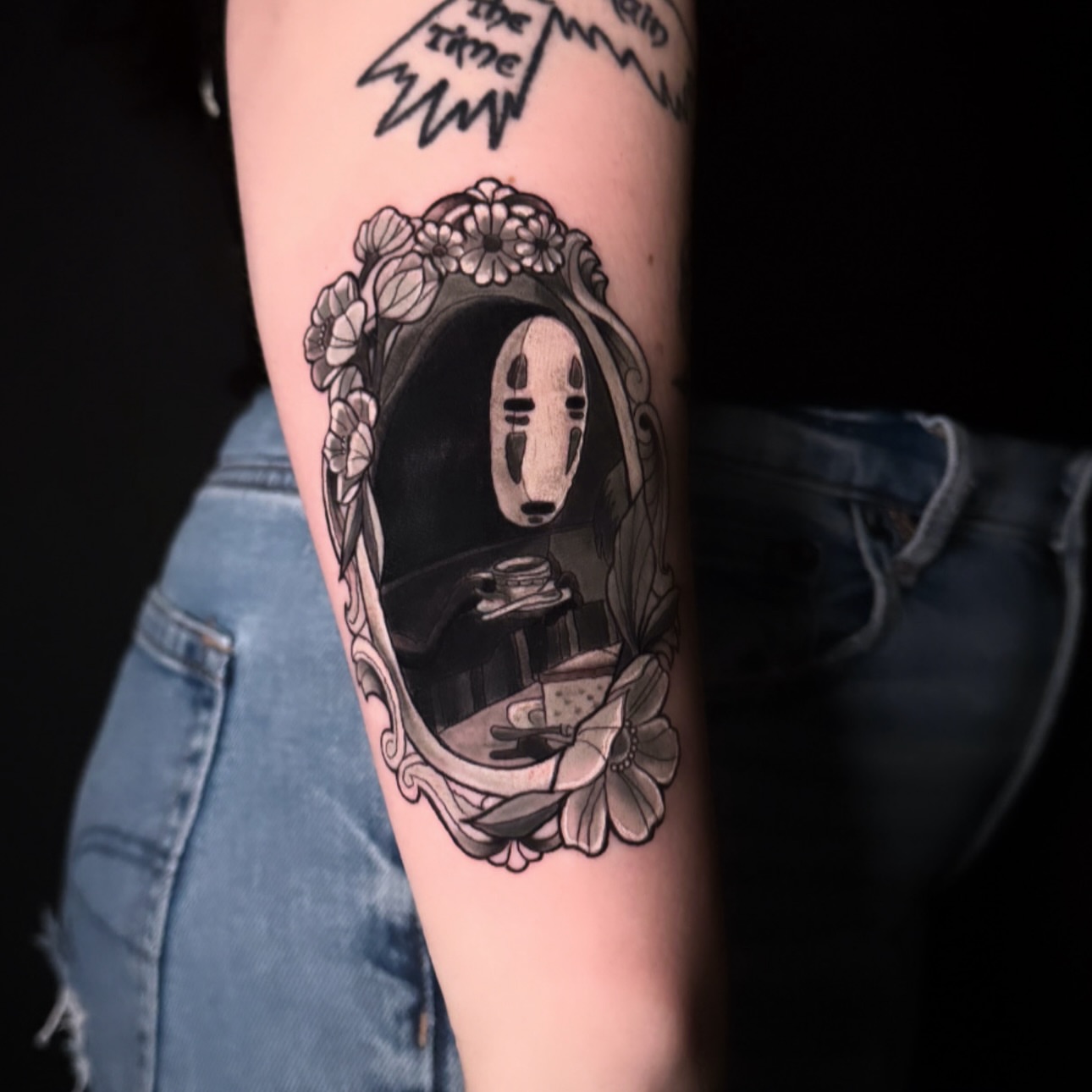 No face character anime tattoo on the forearm by Lindsey Lane, Dallas, Texas