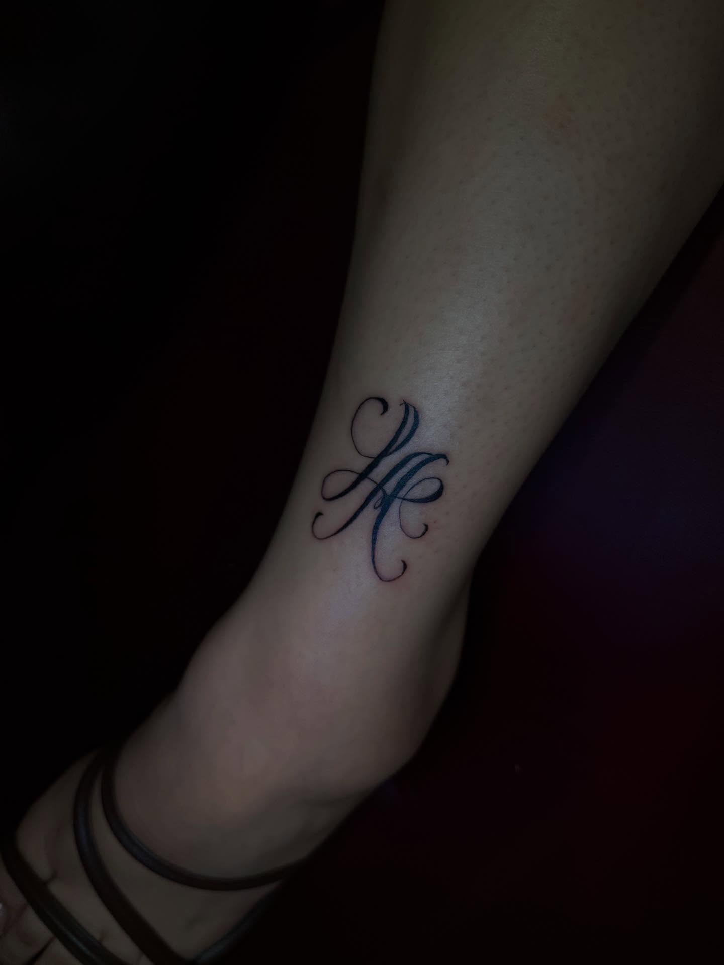 Script lettering lettering script tattoo on the forearm by Los Angeles Tattoo Artist
