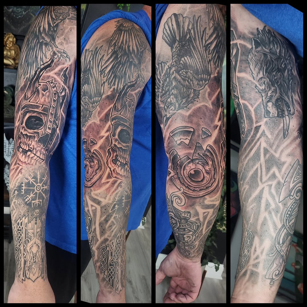 Viking skull and raven sleeve realism tattoo on the forearm by Geo