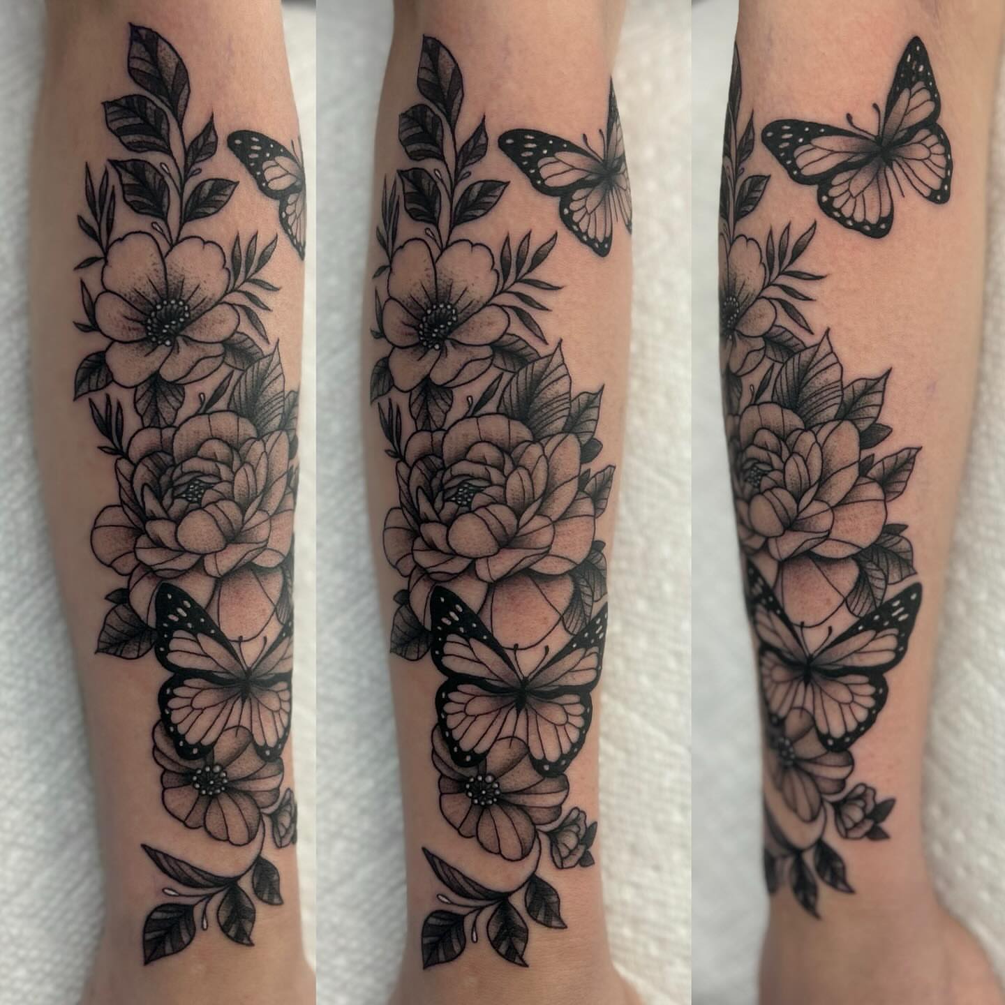 Flowers and butterflies realism tattoo on the forearm by Abby Watts, Columbus, Ohio