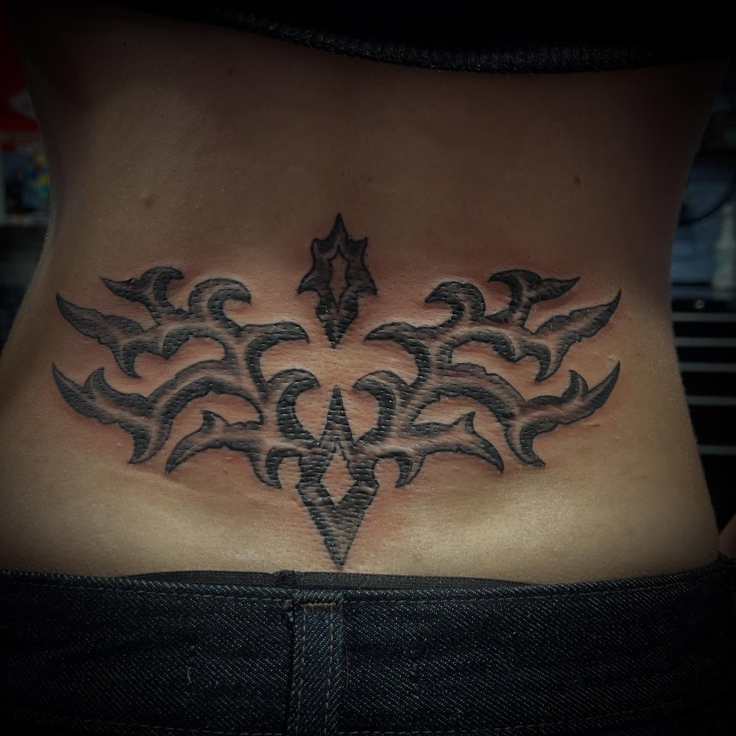 Tribal design tribal tattoo on the torso by Don Juan