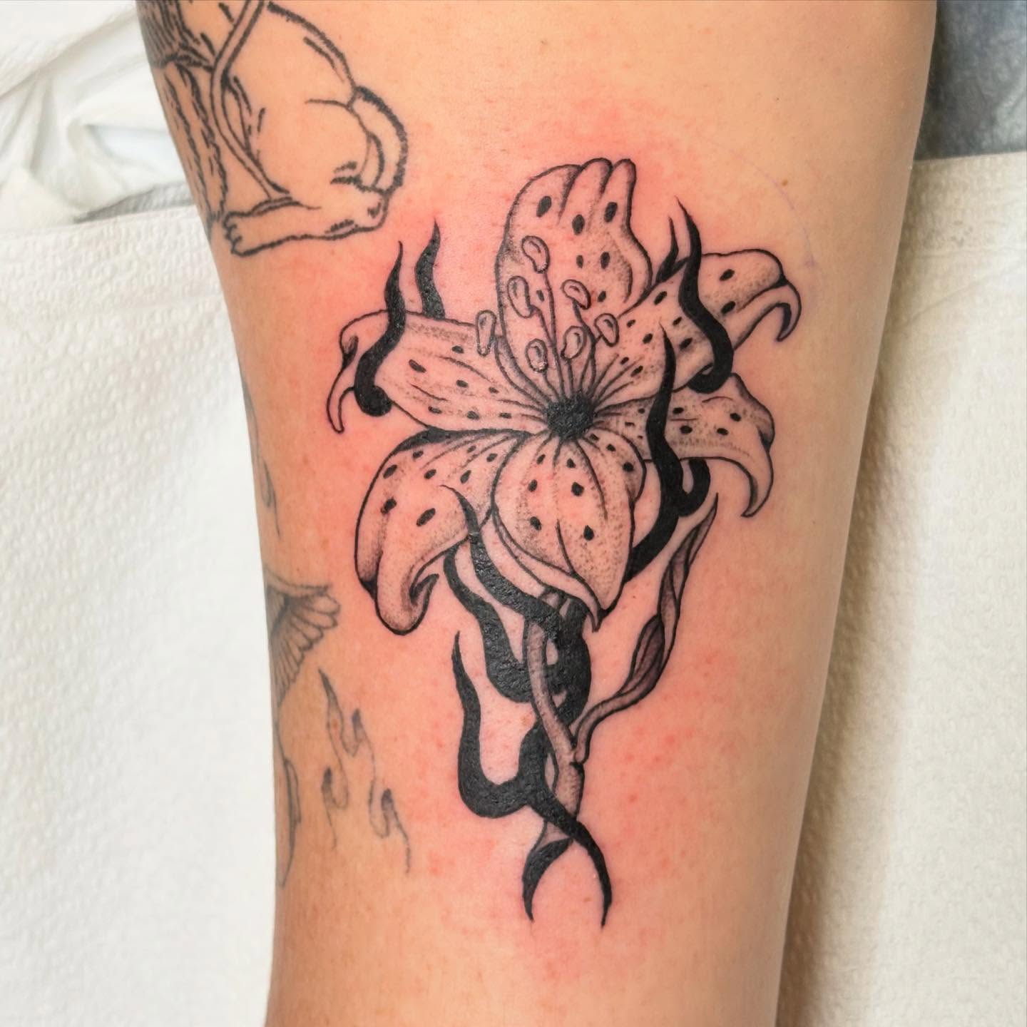 Lily black and grey tattoo on the forearm by ☻︎ Cyd Precious ☹︎