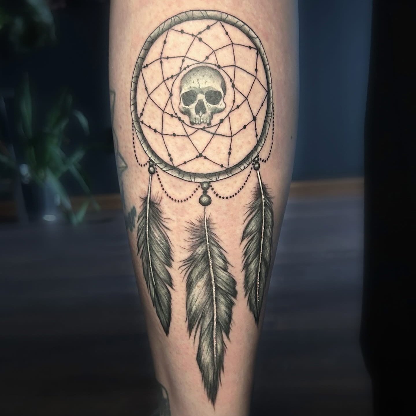 Dreamcatcher with skull dotwork tattoo on the forearm by Vanessa Kendyll’s Tattoos