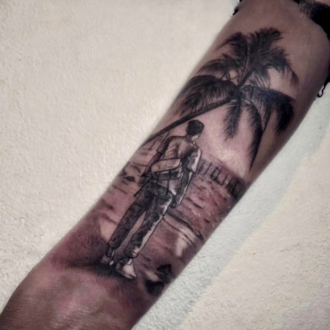 Beach scene realism tattoo on the forearm by Sydney Walk in Tattoo, Sydney, New South Wales