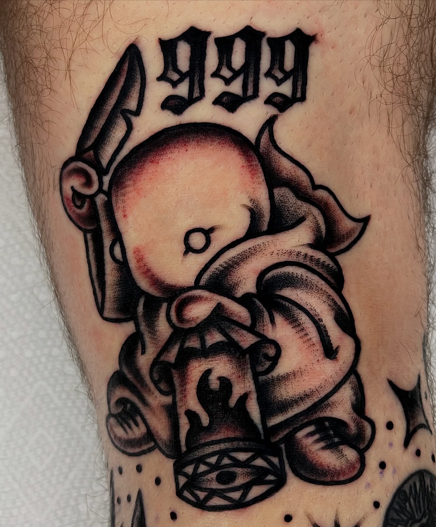 Baby with lantern American traditional tattoo on the forearm by ✨ Gabi ✨