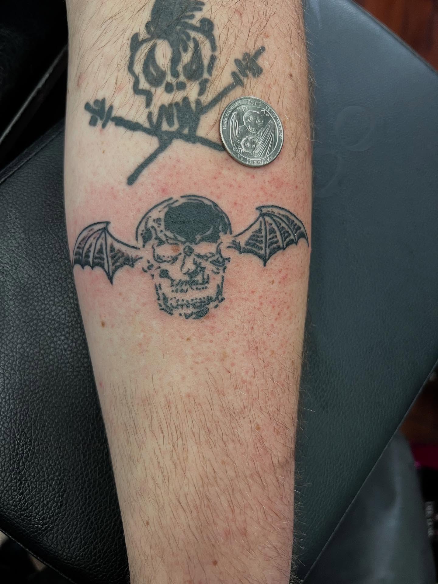 Bat skull black and grey tattoo on the forearm by @lady_raven_tattoo