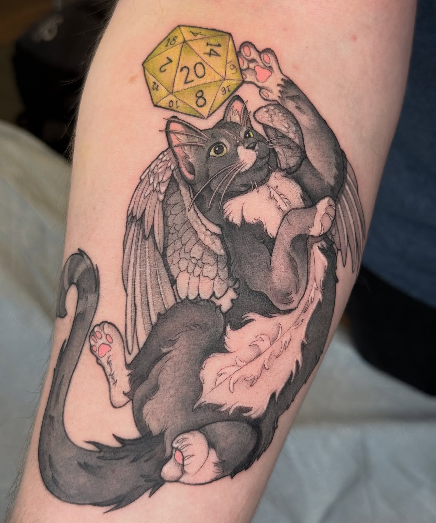 Cat with wings realism tattoo on the forearm by 𝕂𝕒𝕪𝕝𝕒 𝕄𝕒𝕣𝕚𝕖 𝔹𝕝𝕚𝕤𝕤
