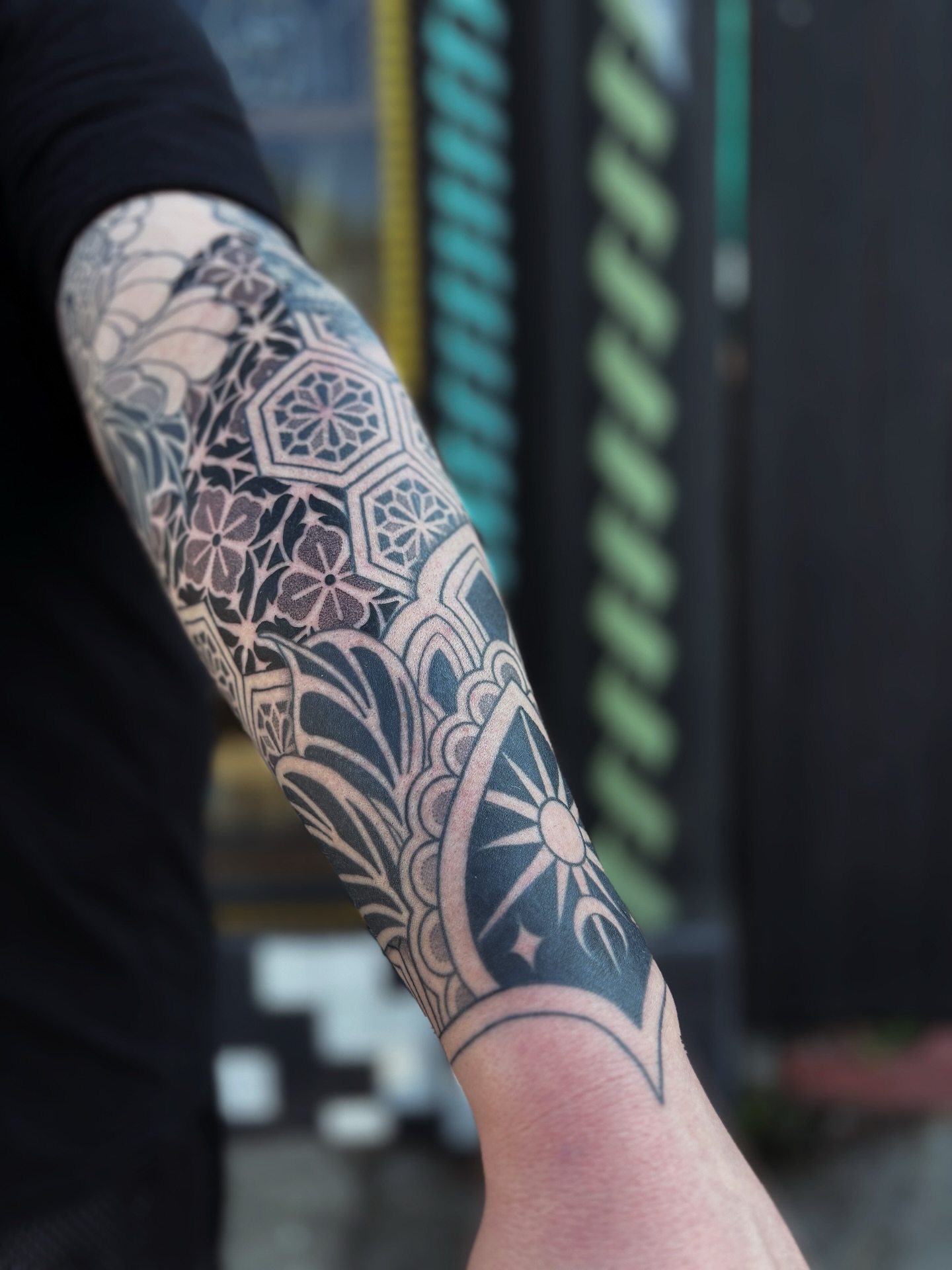 Geometric pattern geometric tattoo on the forearm by Storm Smith