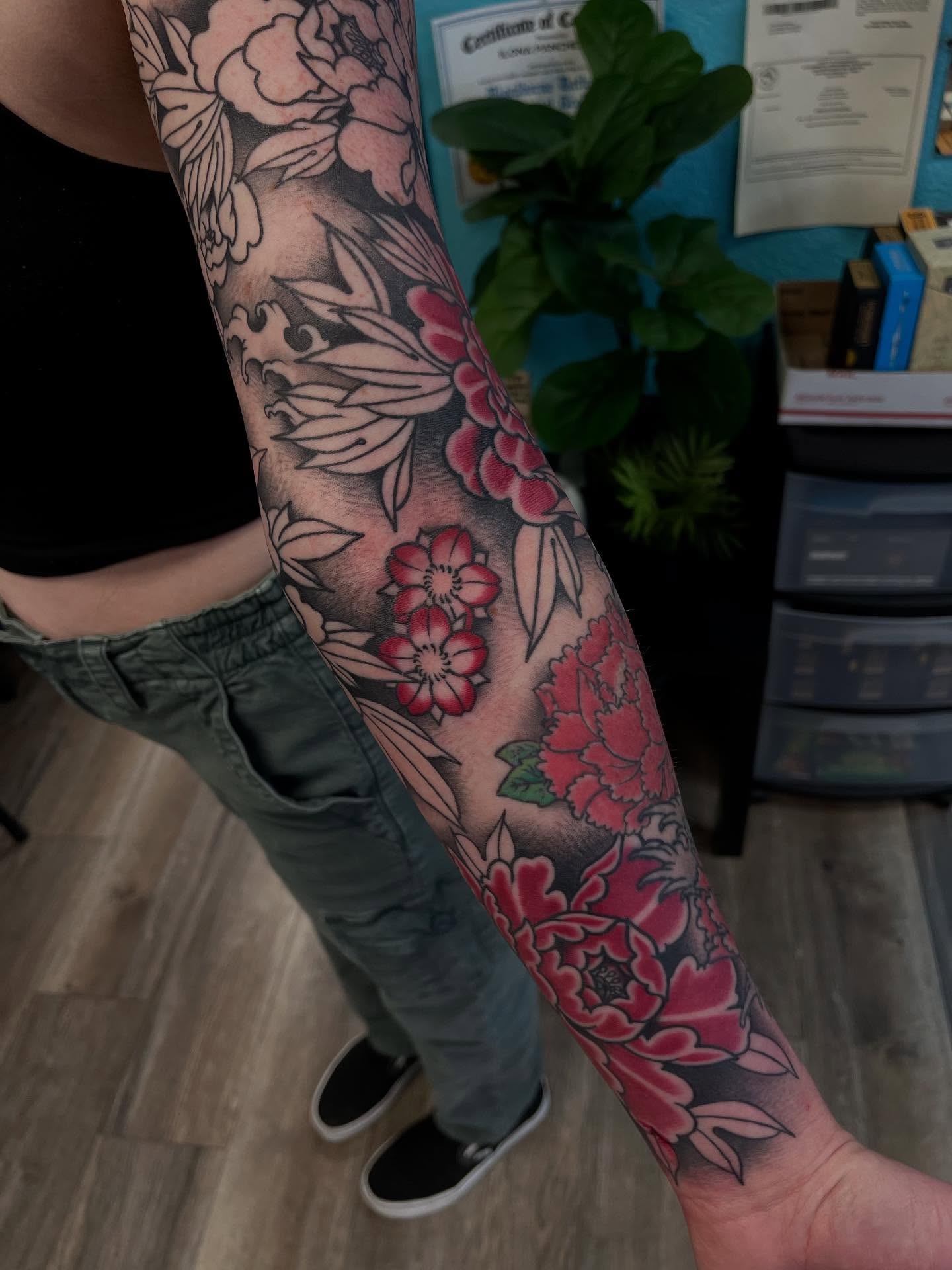 Floral arrangement japanese irezumi tattoo on the forearm by Sacramento Tattoos (Ilona)