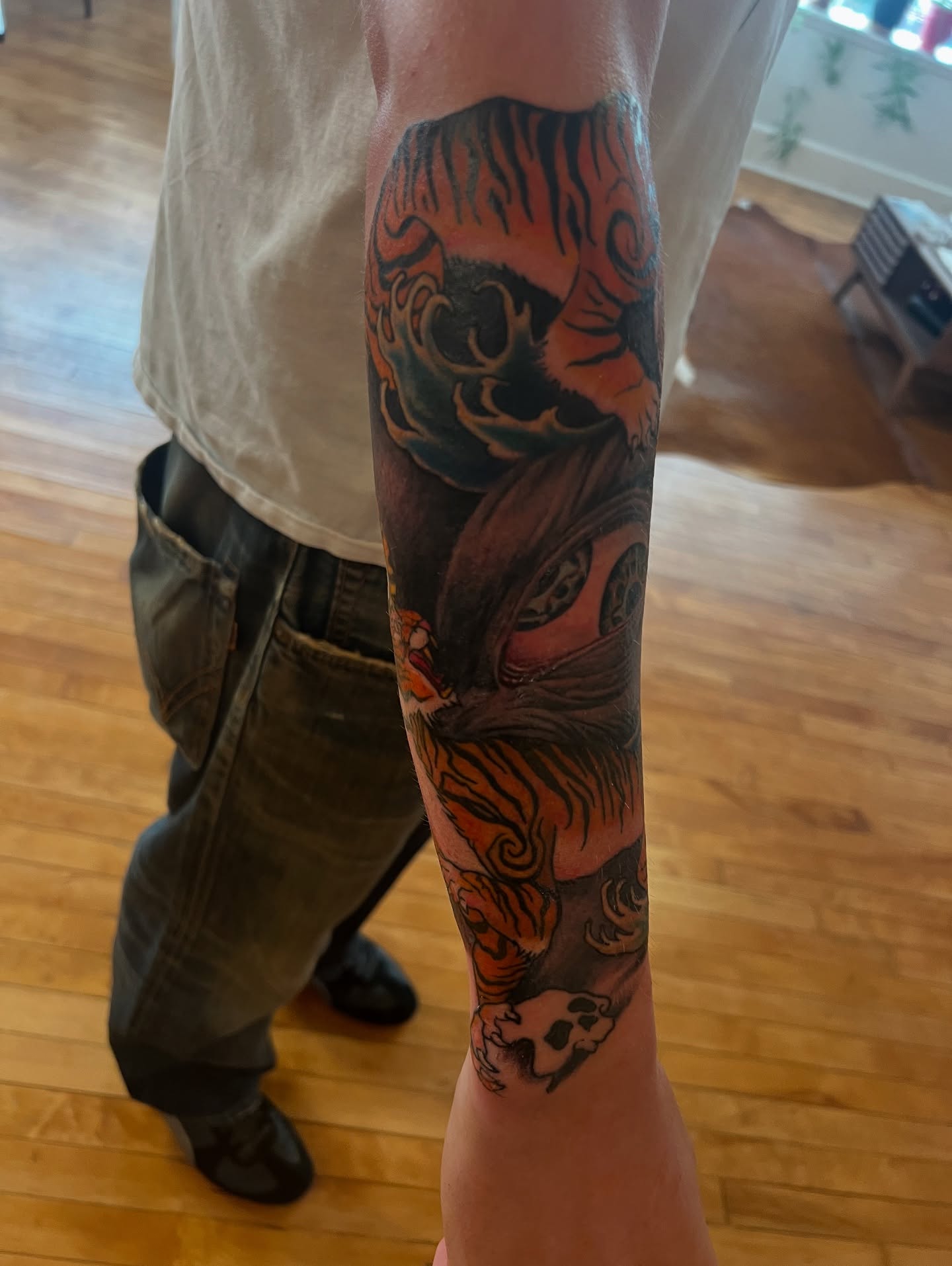 Tiger American traditional tattoo on the forearm by steven