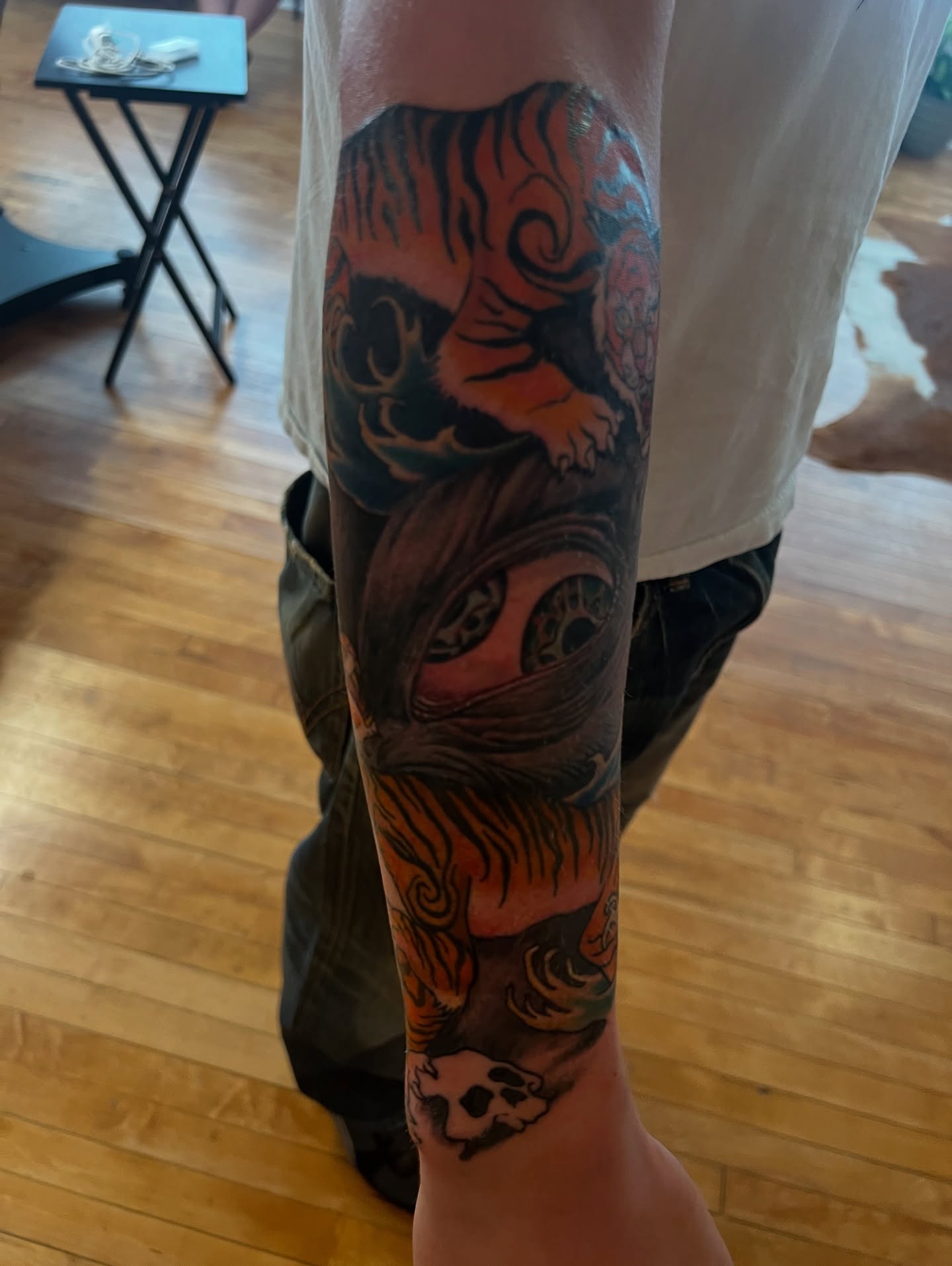 Tiger and eye American traditional tattoo on the forearm by steven