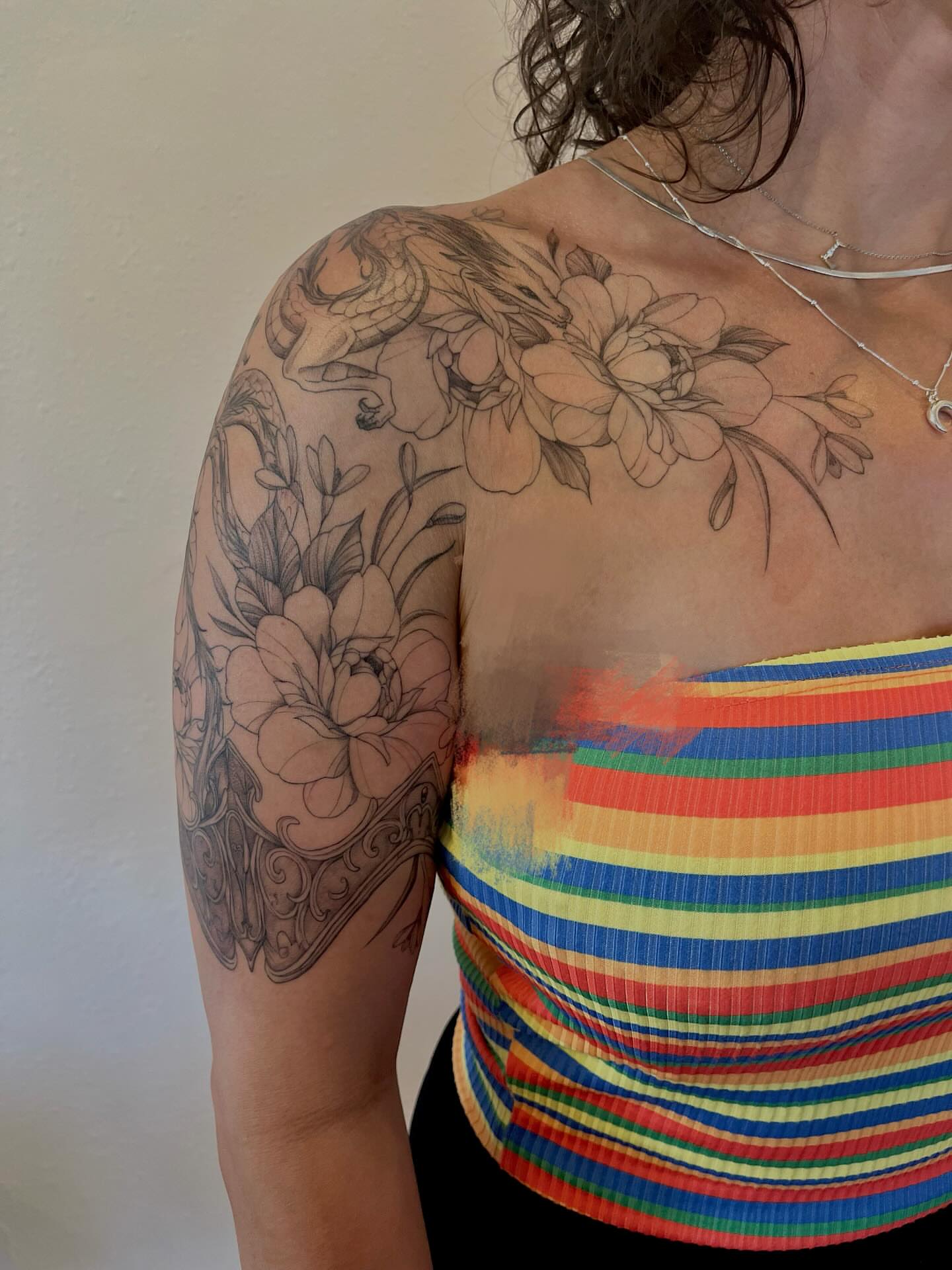 Floral and dragon black and grey tattoo on the shoulder by Kite.Tattoo_Amber
