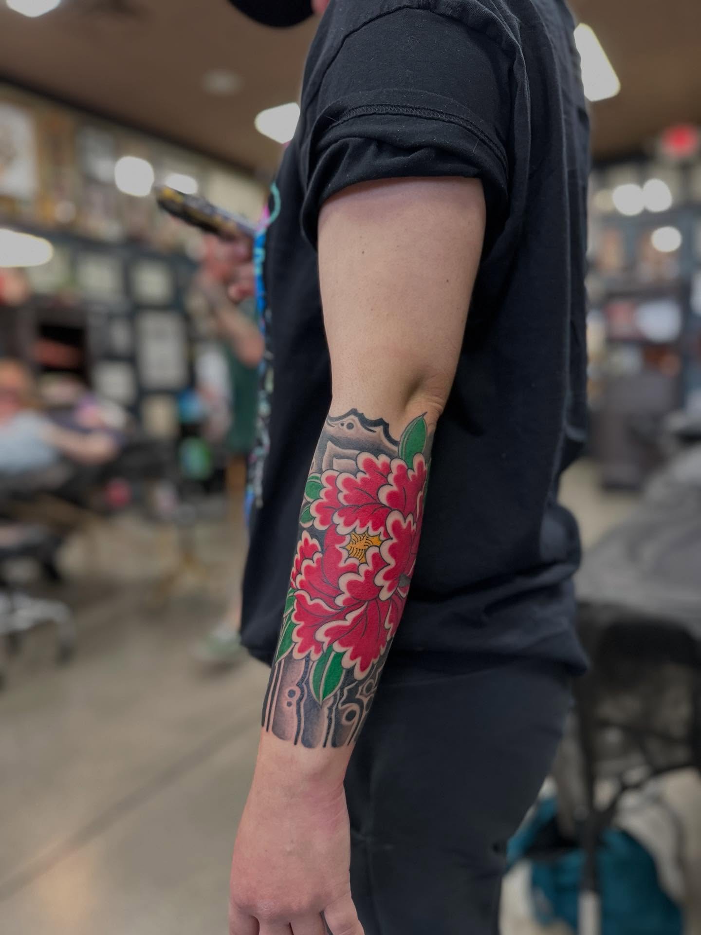 Peony japanese irezumi tattoo on the forearm by Shawn Feng