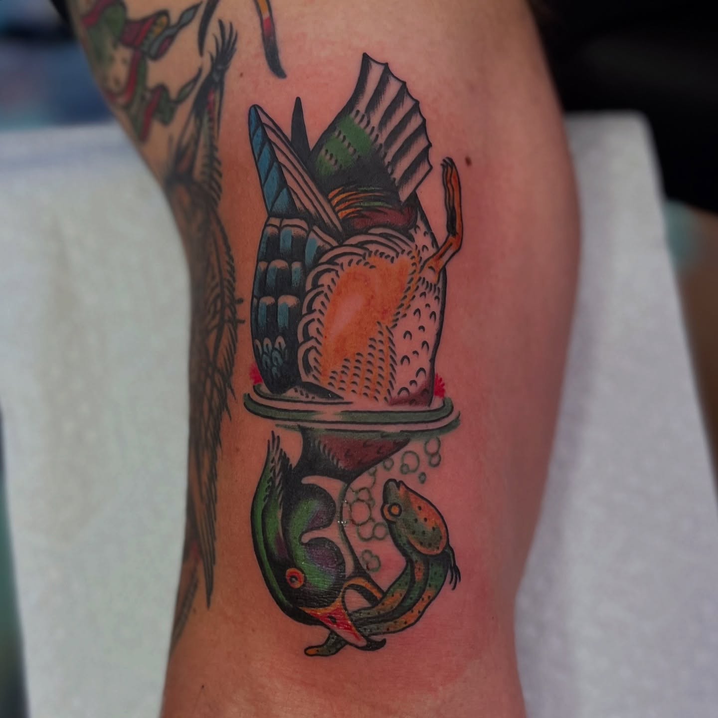 Fish and bowl American traditional tattoo on the forearm by @brandonhuckabey, Denver, Colorado