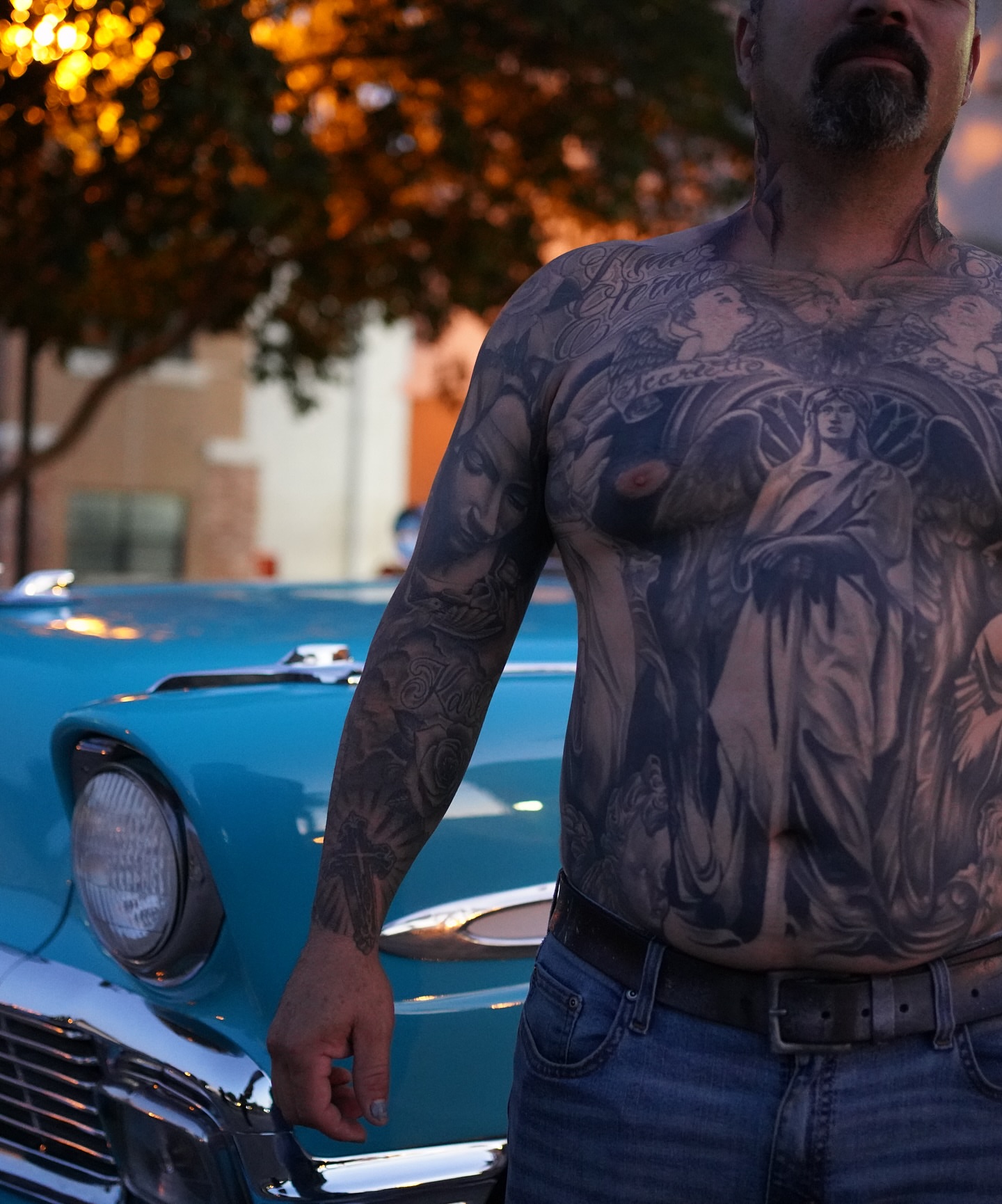 Angels American traditional tattoo on the chest by tombstone