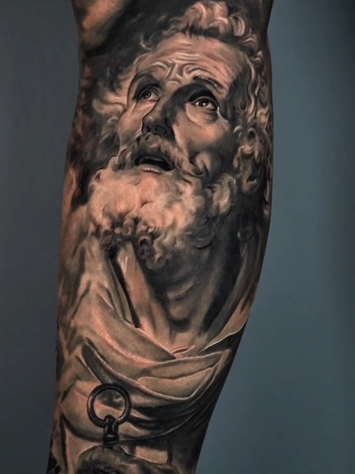 Ancient man realism tattoo on the forearm by Jose Carlos