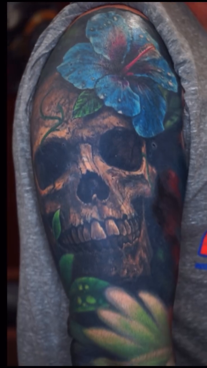 Skull with flowers and fruit realism tattoo by Tony Johnson - Tattoo Artist, Huntsville, Alabama
