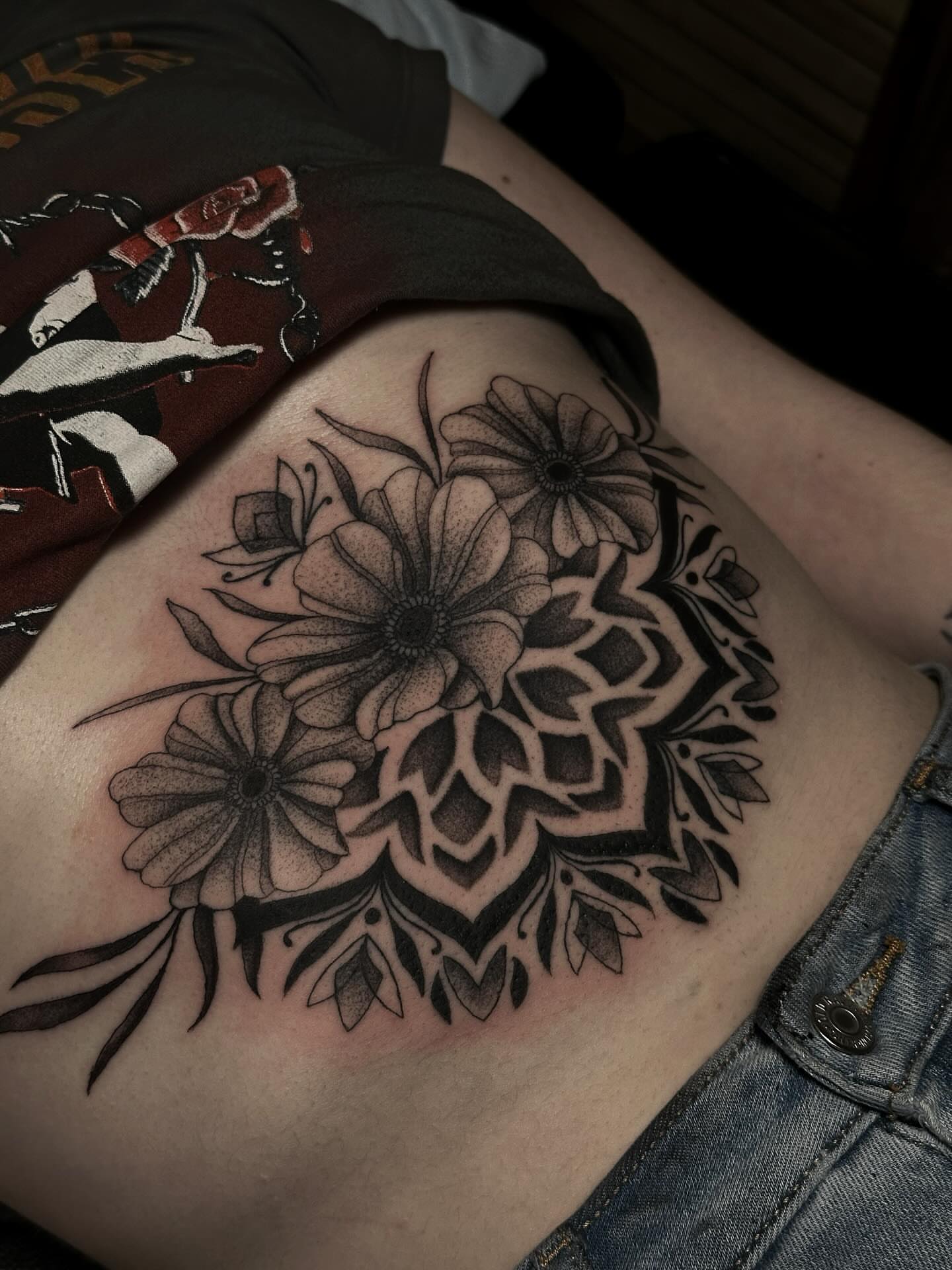 Floral mandala dotwork tattoo on the thigh by Elizabeth Tabler