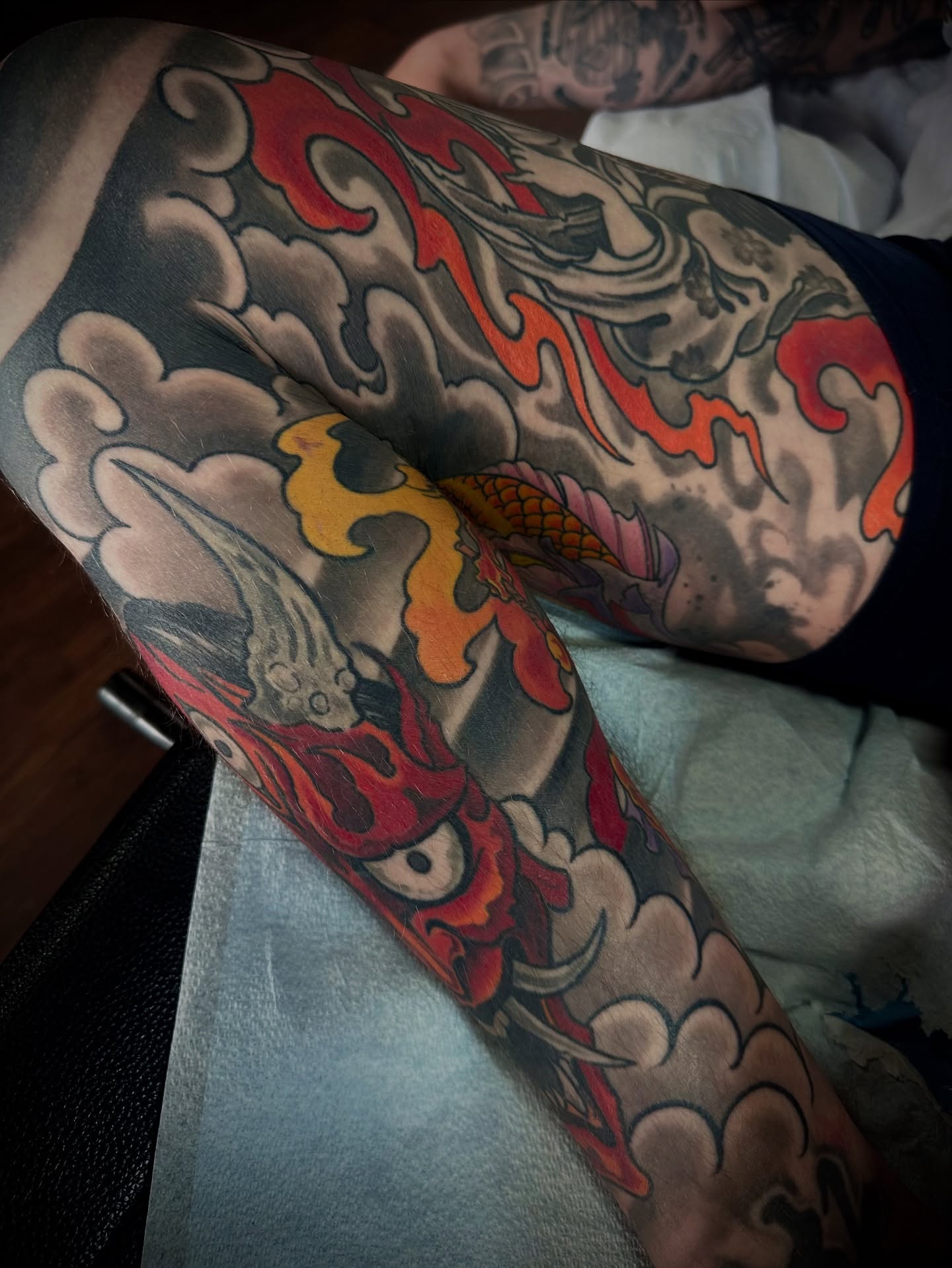 Flame and bird japanese irezumi tattoo on the upper arm by Culleton Paramore