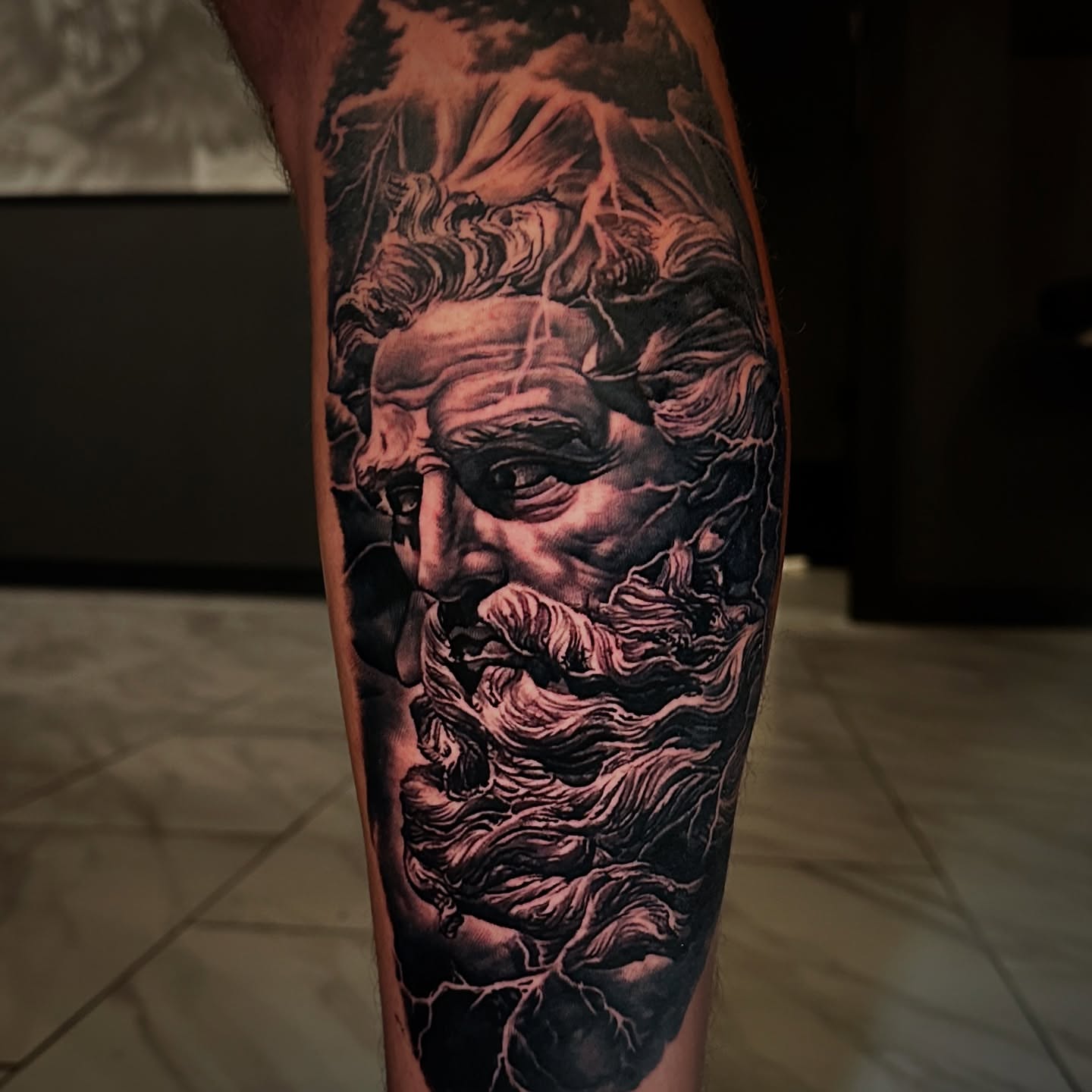 God of the sea realism tattoo on the forearm by Chrisjansentattoo