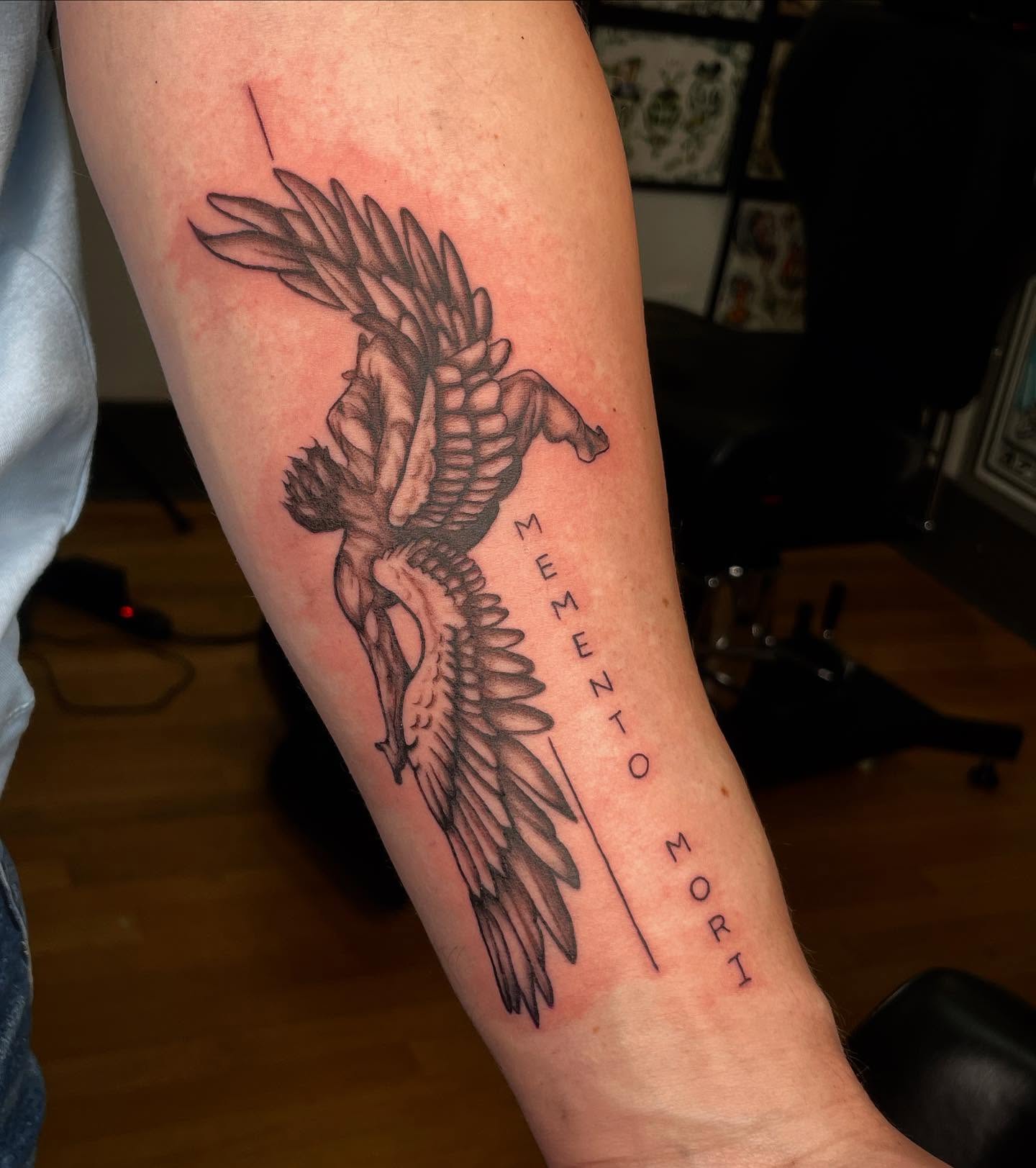 Phoenix black and grey tattoo on the forearm by Harlow ❤️‍🔥
