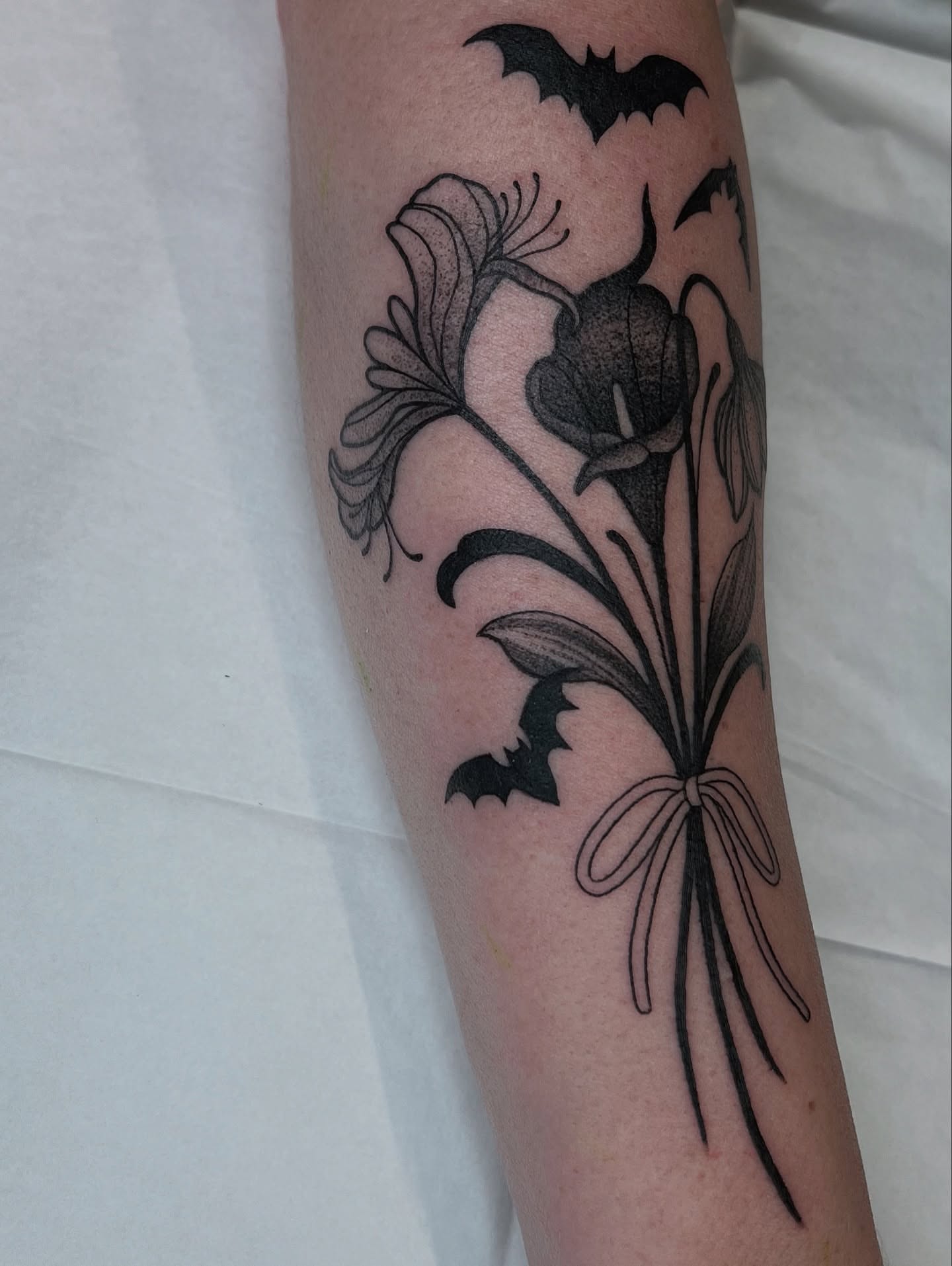 Lily bouquet realism tattoo on the forearm by ๐๐๐ฅ๐ฅ๐ข๐ ๐๐๐ก๐ข๐ฅ๐ฅ๐ข๐ง๐