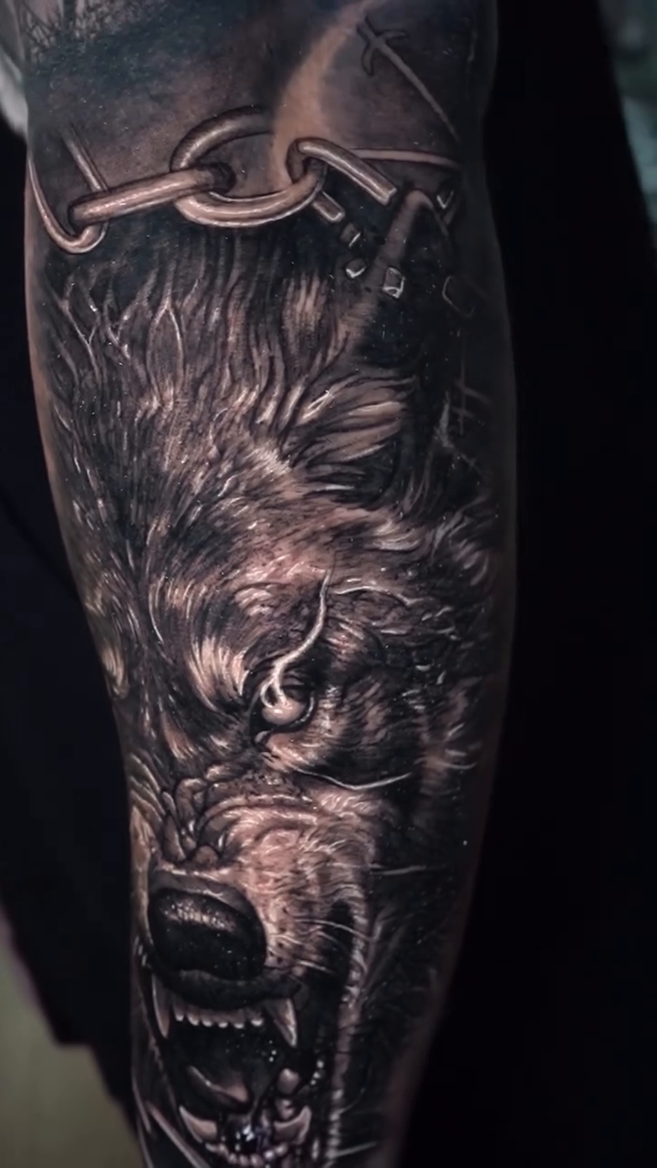 Wolf head with chain realism tattoo by Ryan Gage Gonzalez