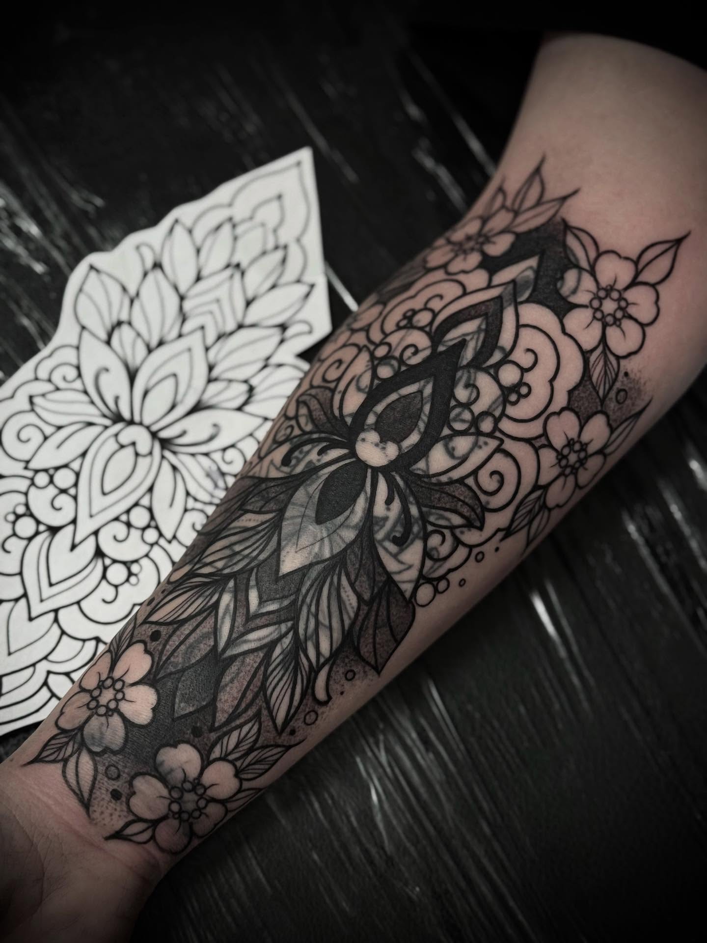 Floral mandala black and grey tattoo on the forearm by M A R I B e T H▪️k L A A R
