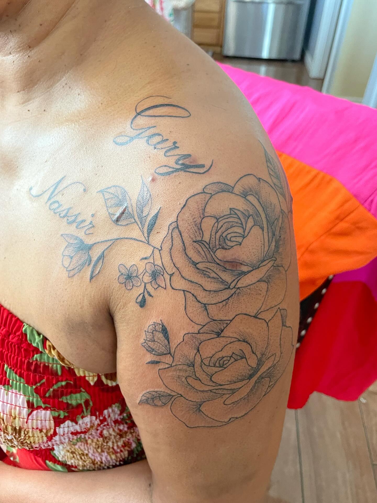 Roses and script black and grey tattoo on the shoulder by ART