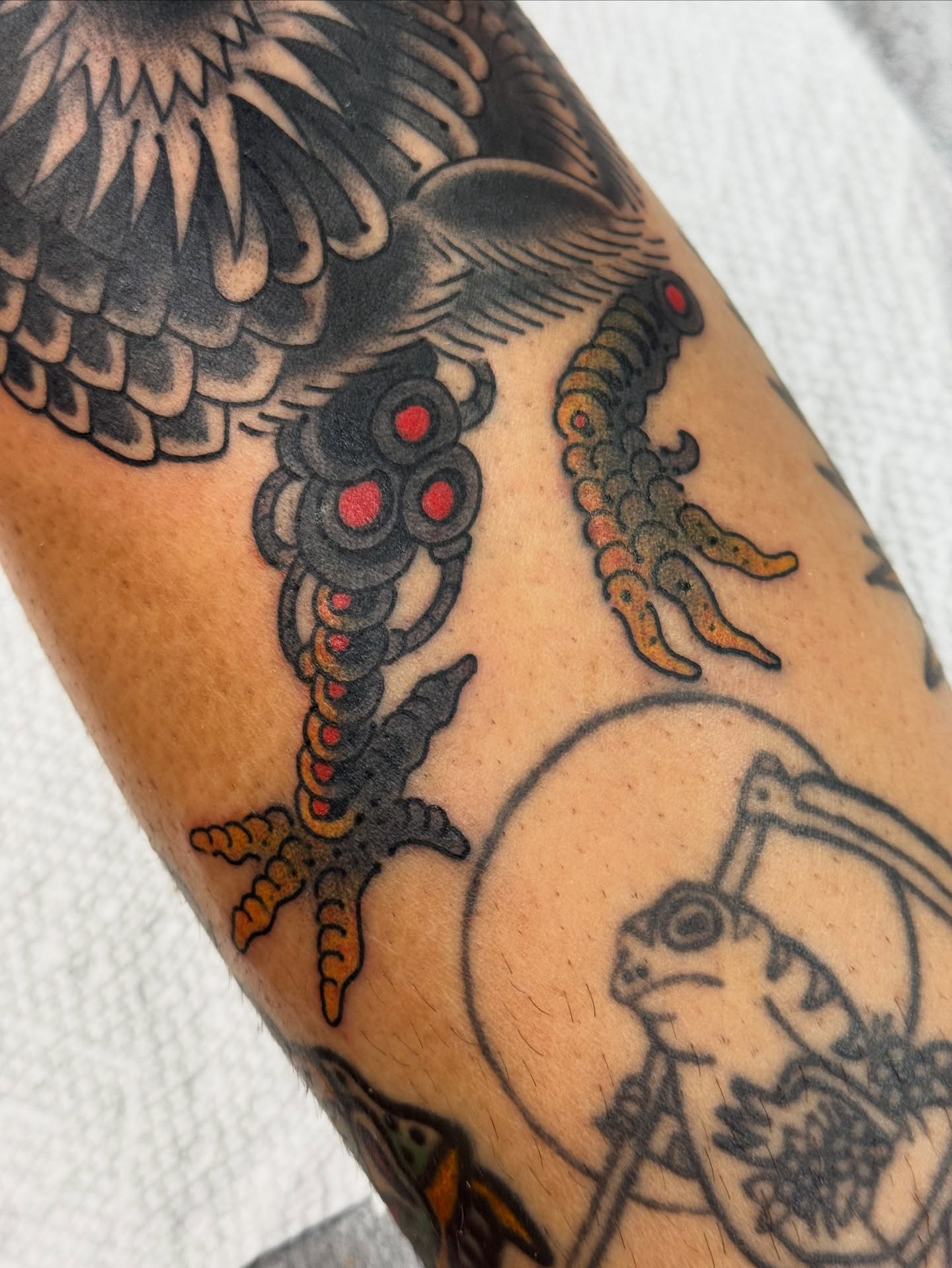 Serpent American traditional tattoo on the forearm by Chris Orta