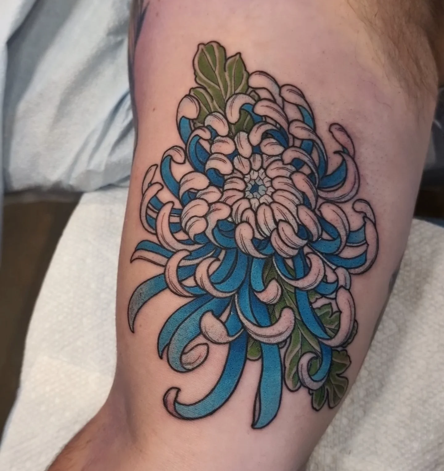Chrysanthemum japanese irezumi tattoo on the thigh by English Cousins, Nashville, Tennessee