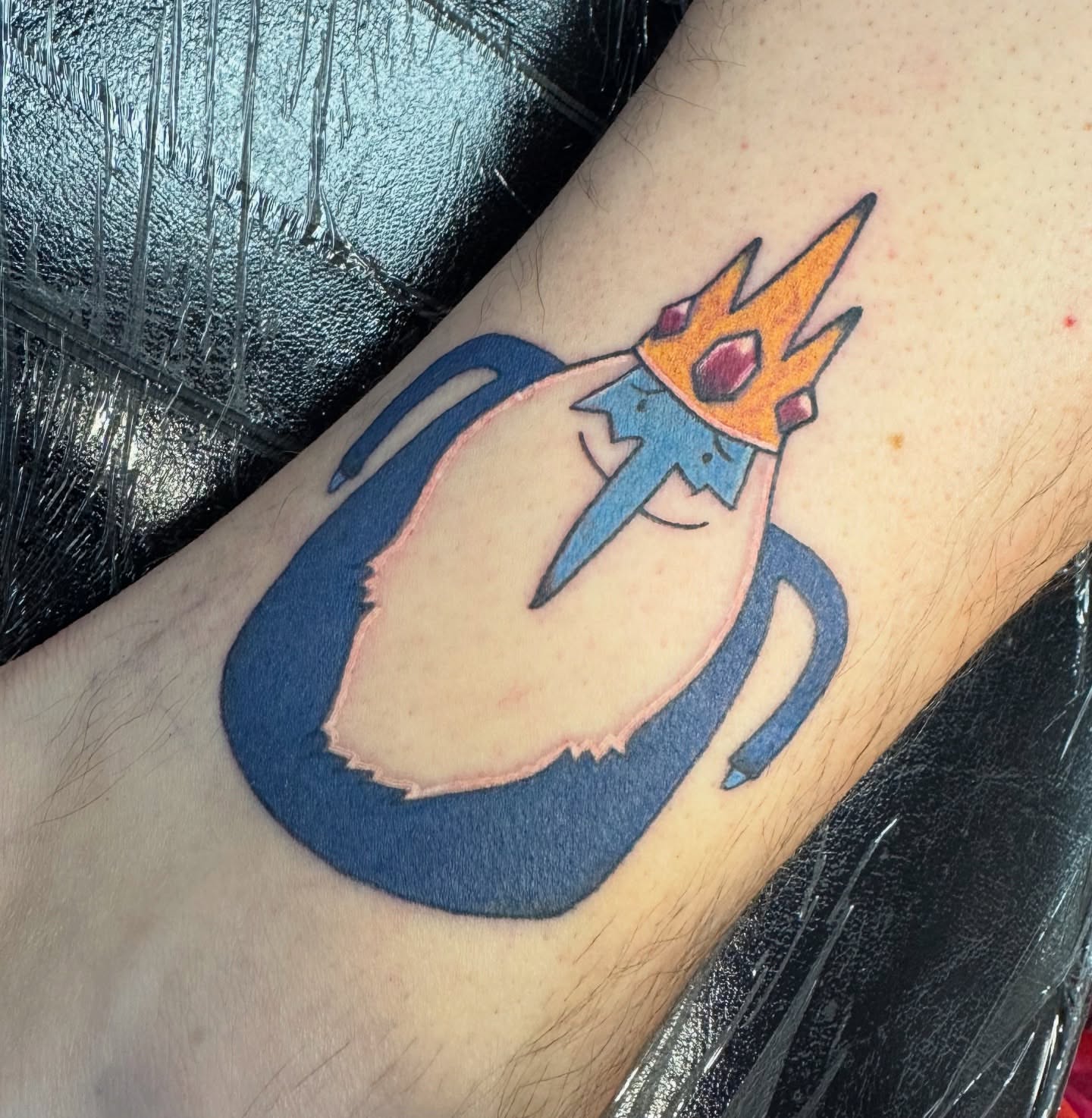 Sword new school tattoo on the forearm by Erin Moore