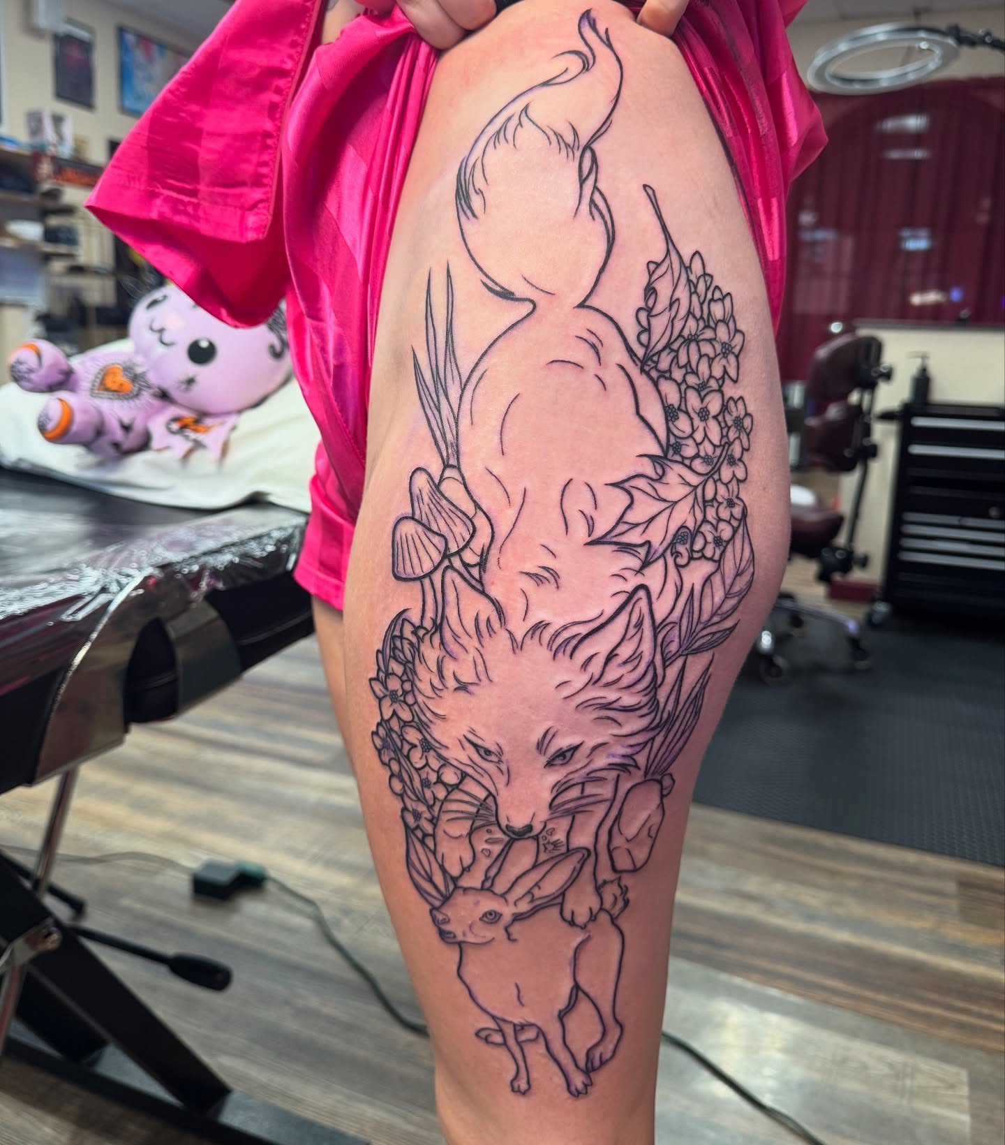 Fox and deer black and grey tattoo on the thigh by Erin Moore
