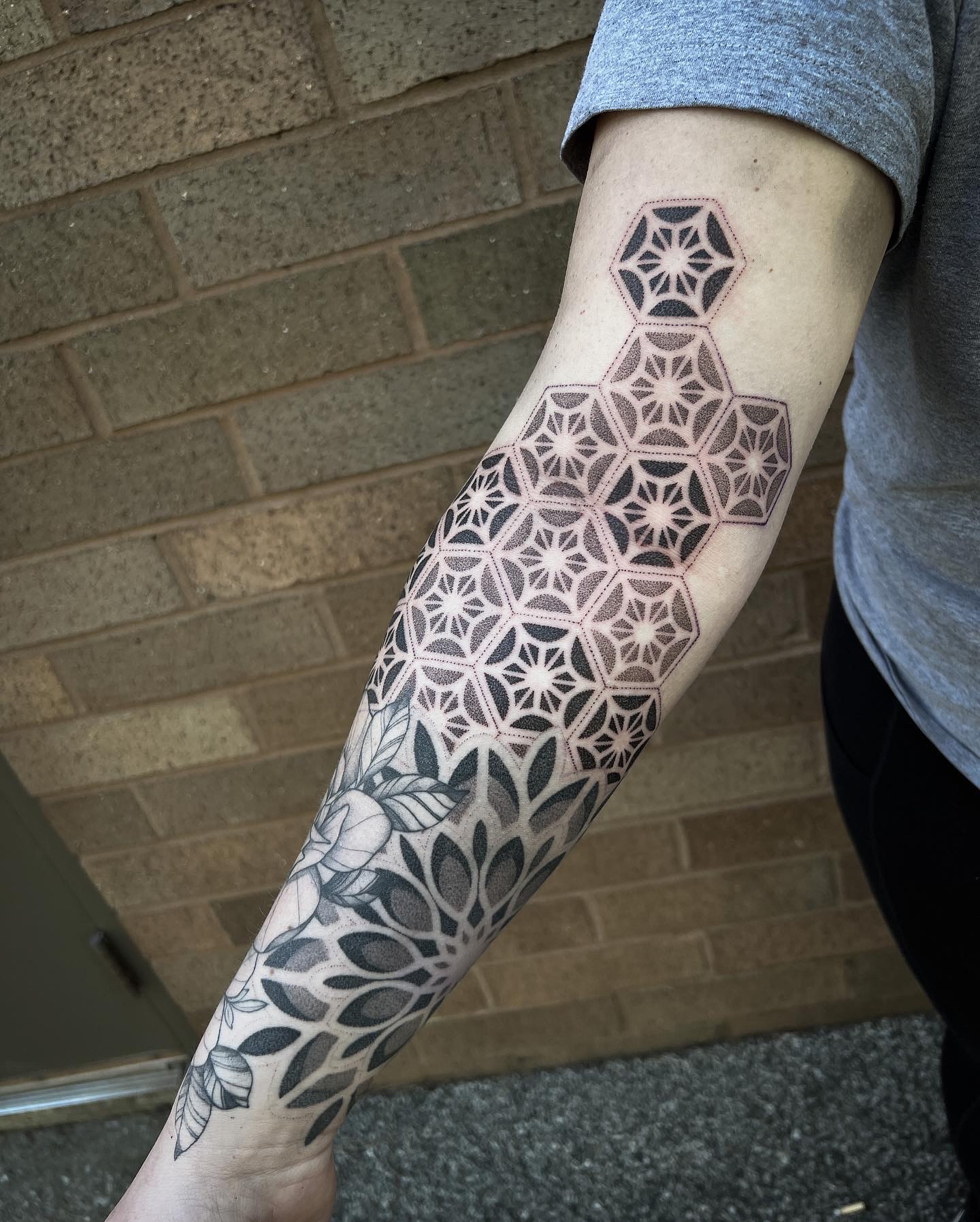Geometric pattern geometric tattoo on the forearm by Christofer Irvin