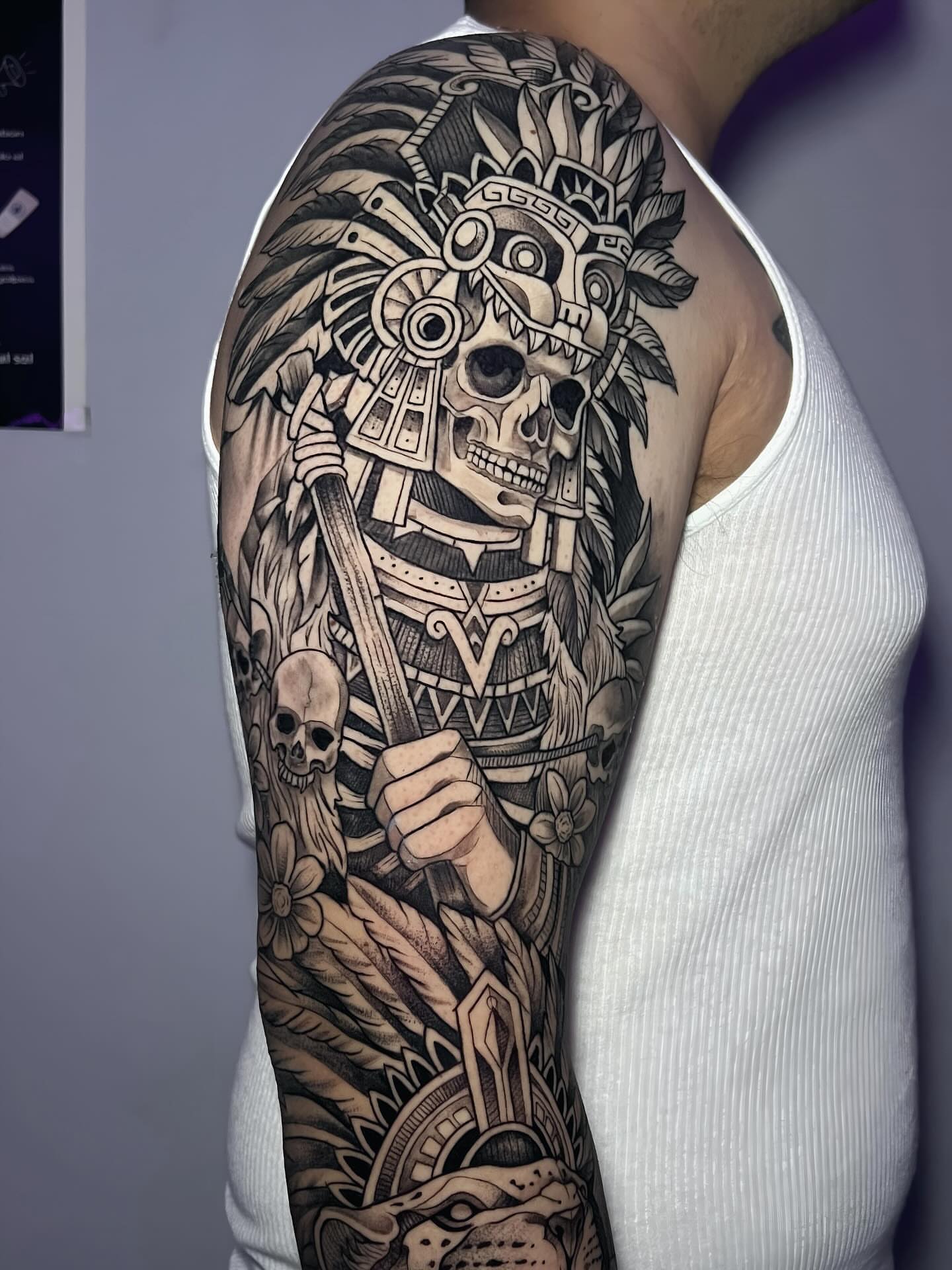 Mexican warrior skull geometric tattoo on the upper arm by ⚜️Lalo Godina Tattoo⚜️