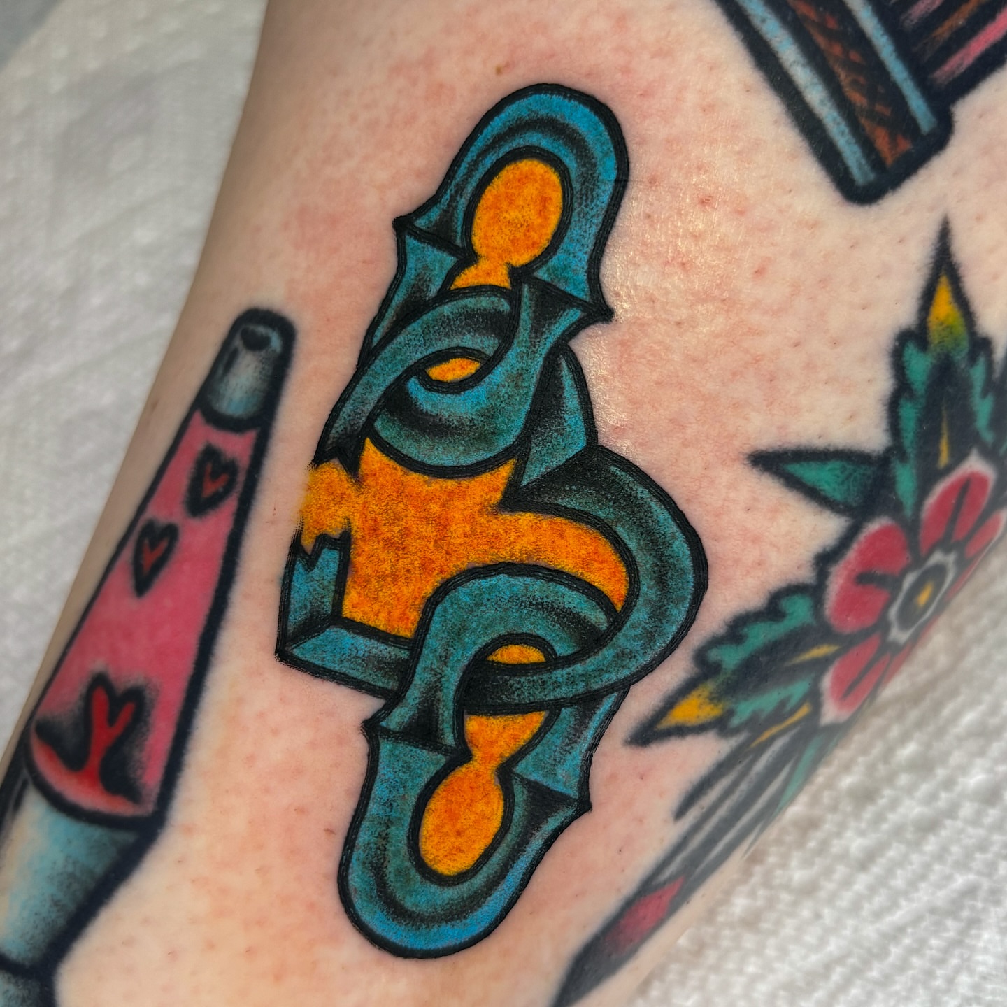Abstract symbol American traditional tattoo on the forearm by ✨ Gabi ✨