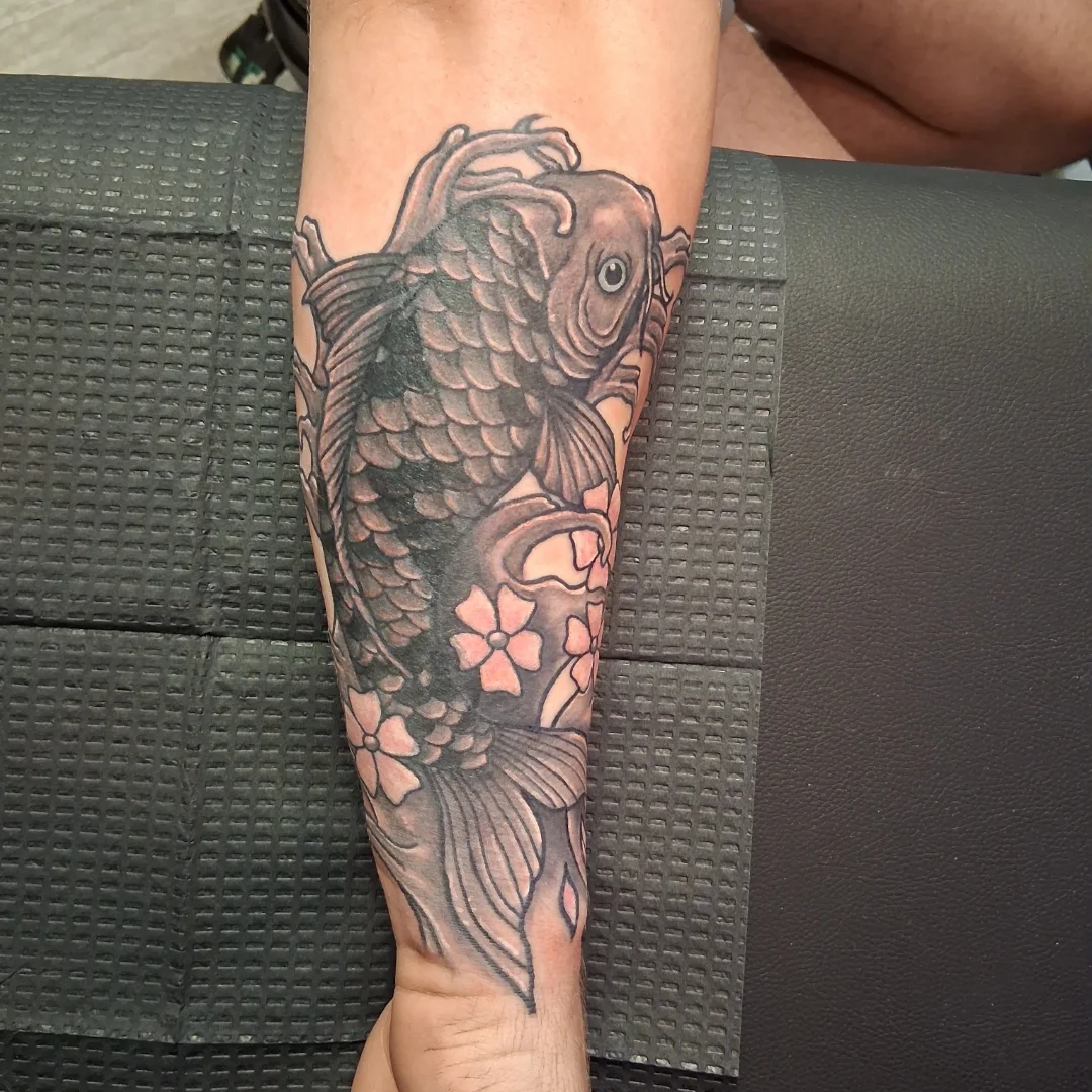 Koi fish japanese irezumi tattoo on the forearm by Dave Johnson, Billings, Montana