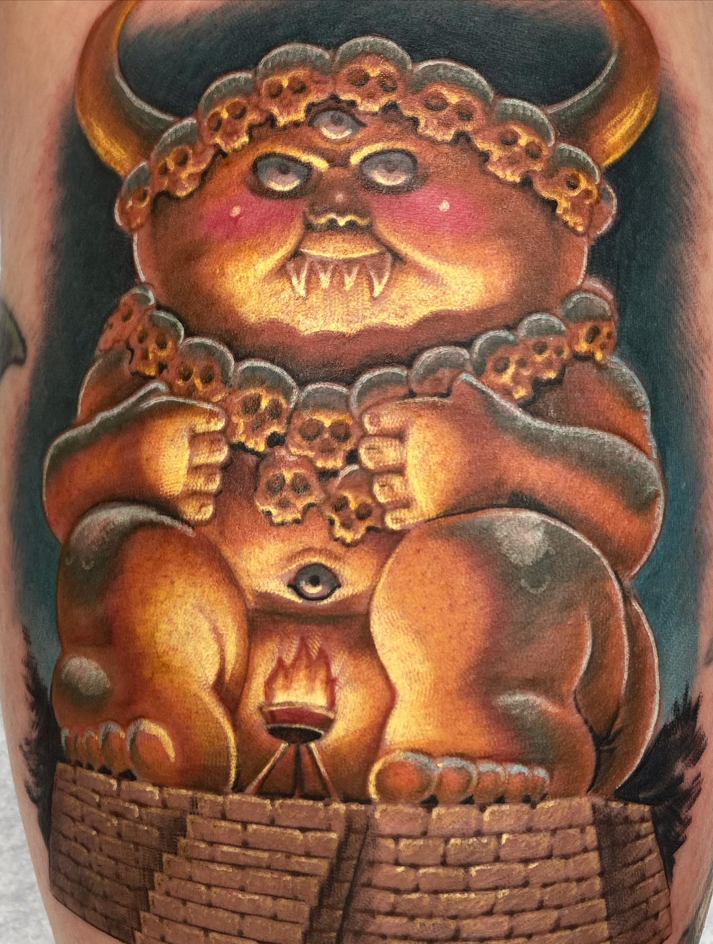 Bull demon tattoo on the forearm by Rick Rayne