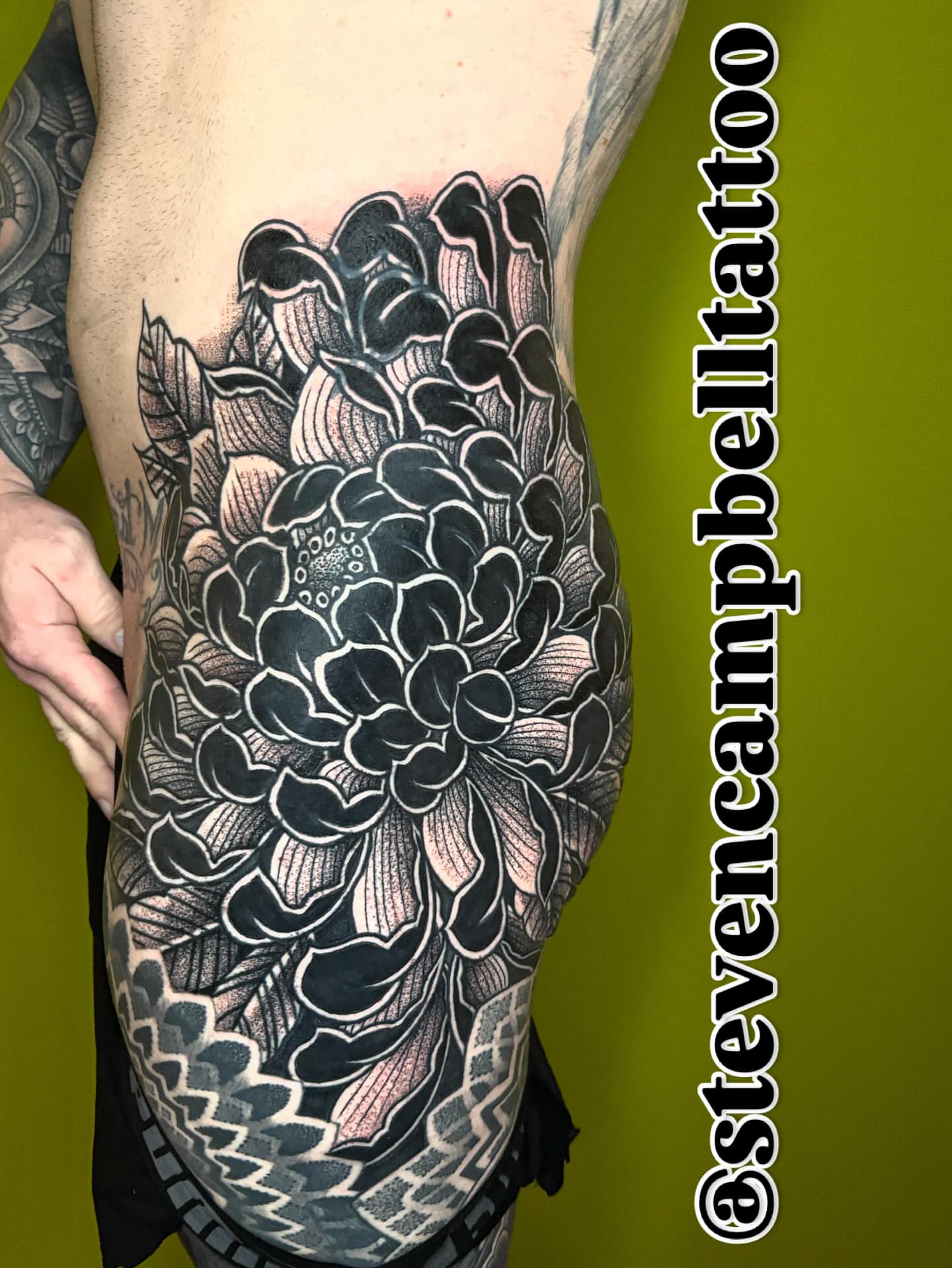 Flower black and grey tattoo on the thigh by Steven Campbell, Kansas City, Missouri
