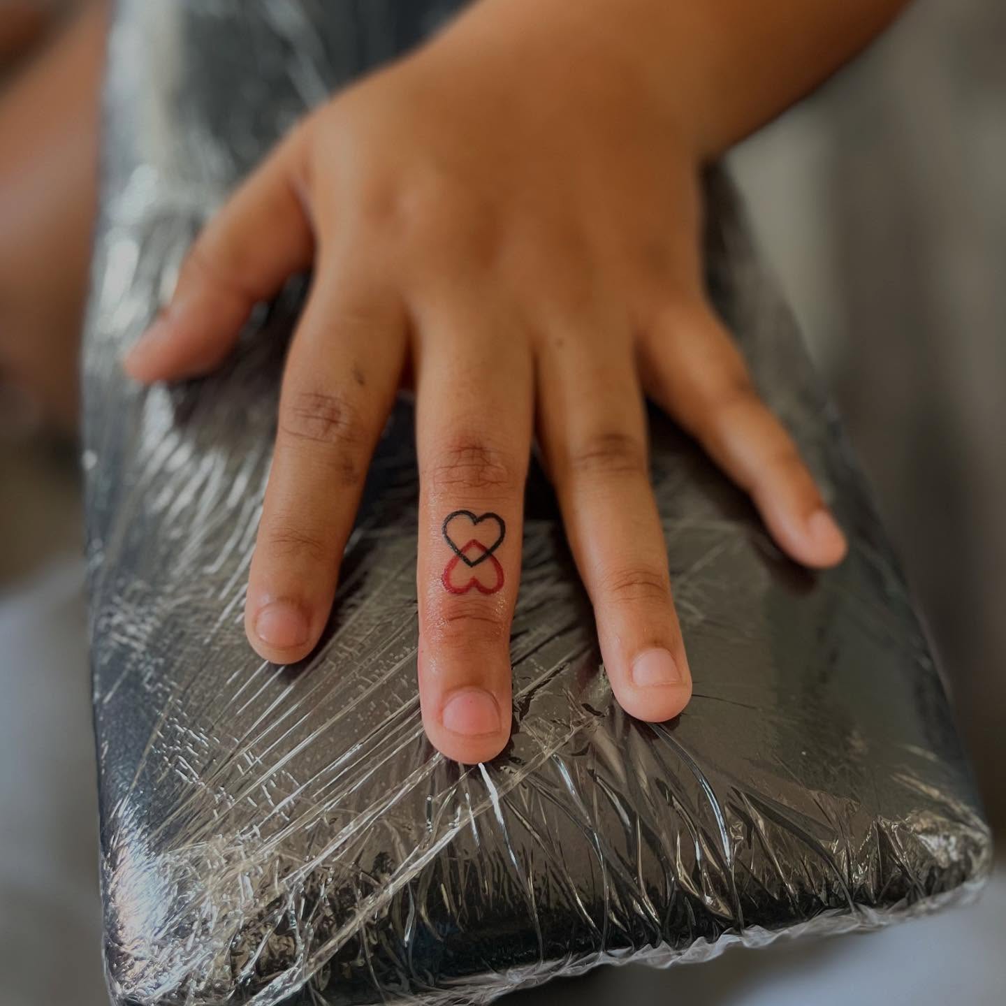 Heart geometric tattoo on the hand by Bris