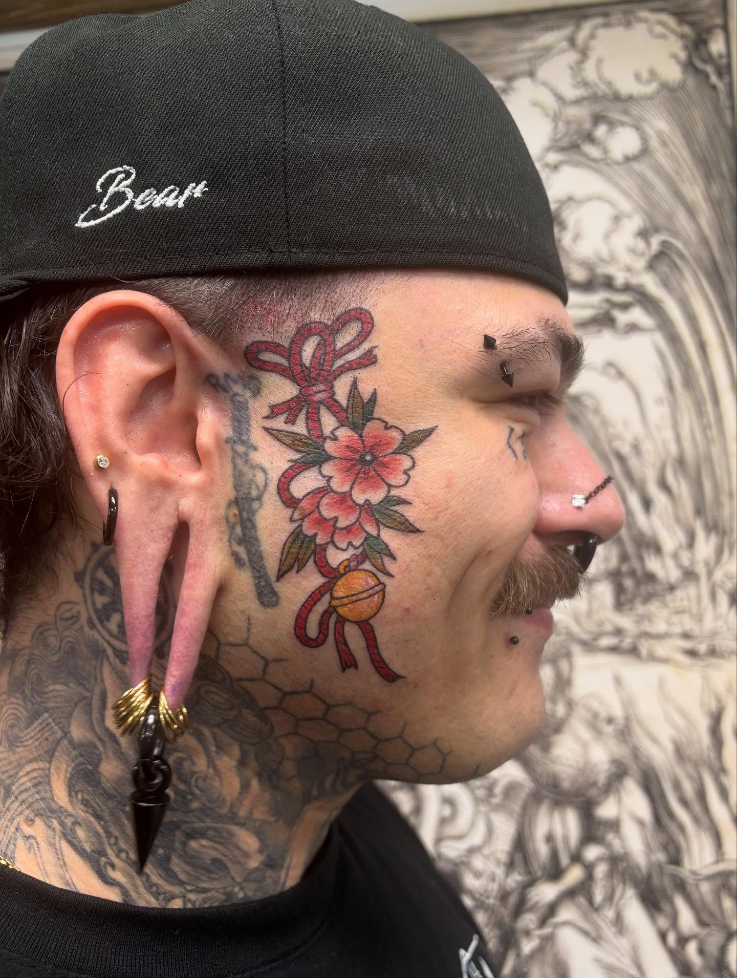 Floral arrangement American traditional tattoo on the head by Jayda Shell