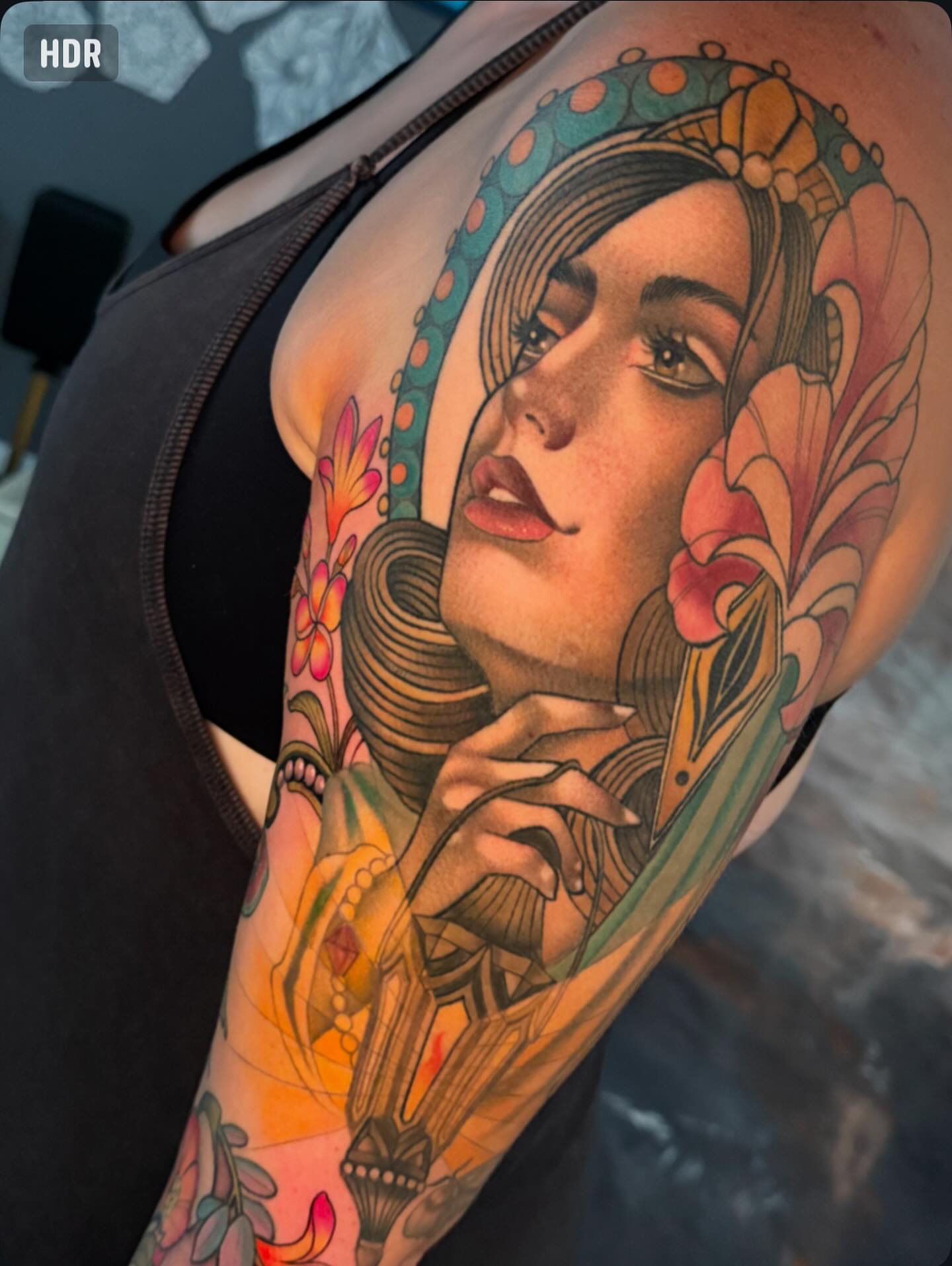 Woman with floral crown American traditional tattoo on the shoulder by Connie Fiorino - Tattoo Artist