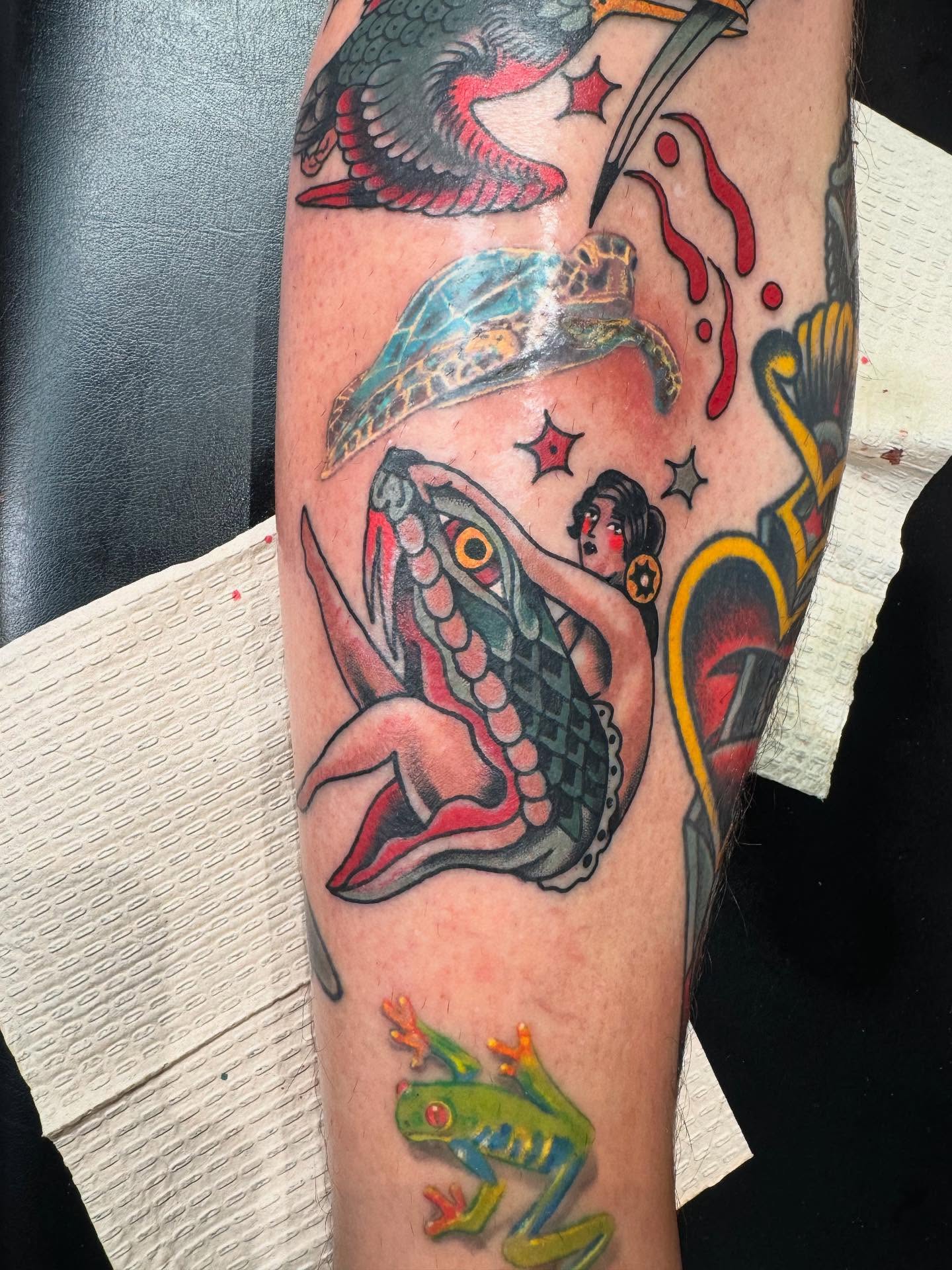 Serpent and woman American traditional tattoo on the forearm by Joe Khay, Hackettstown, New Jersey