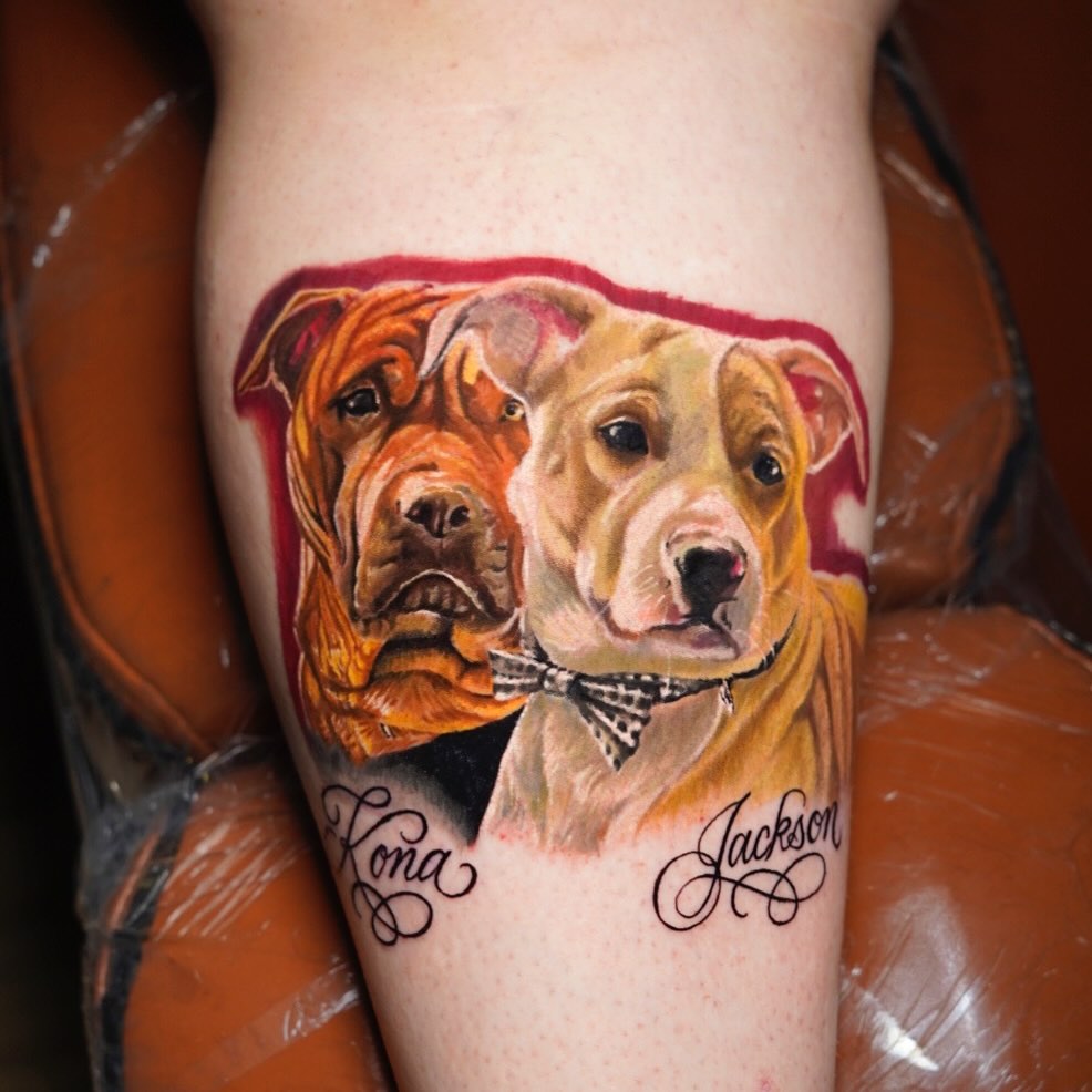 Dogs realism tattoo on the thigh by David Gordon