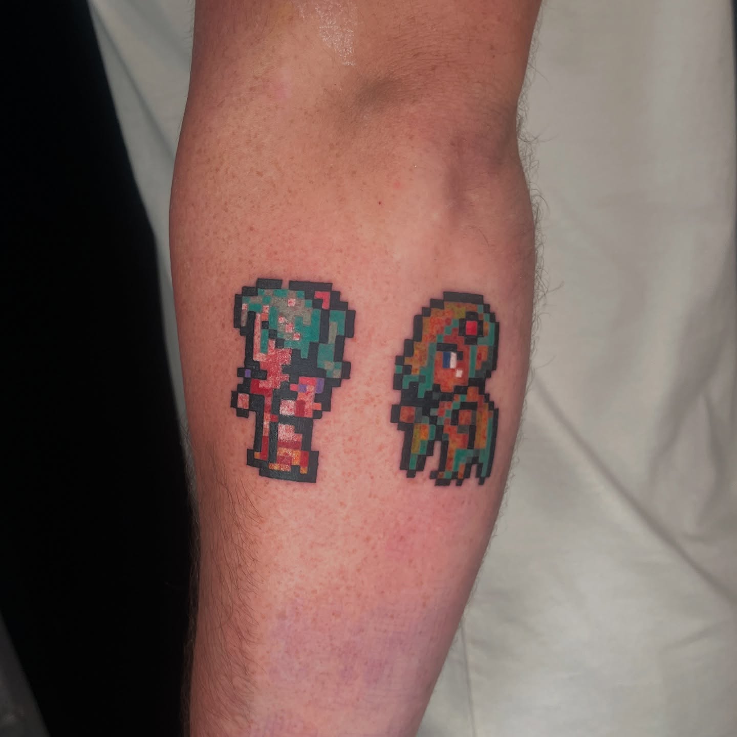 Pixel art characters tattoo on the forearm by soph ଘ(੭ˊᵕˋ)੭